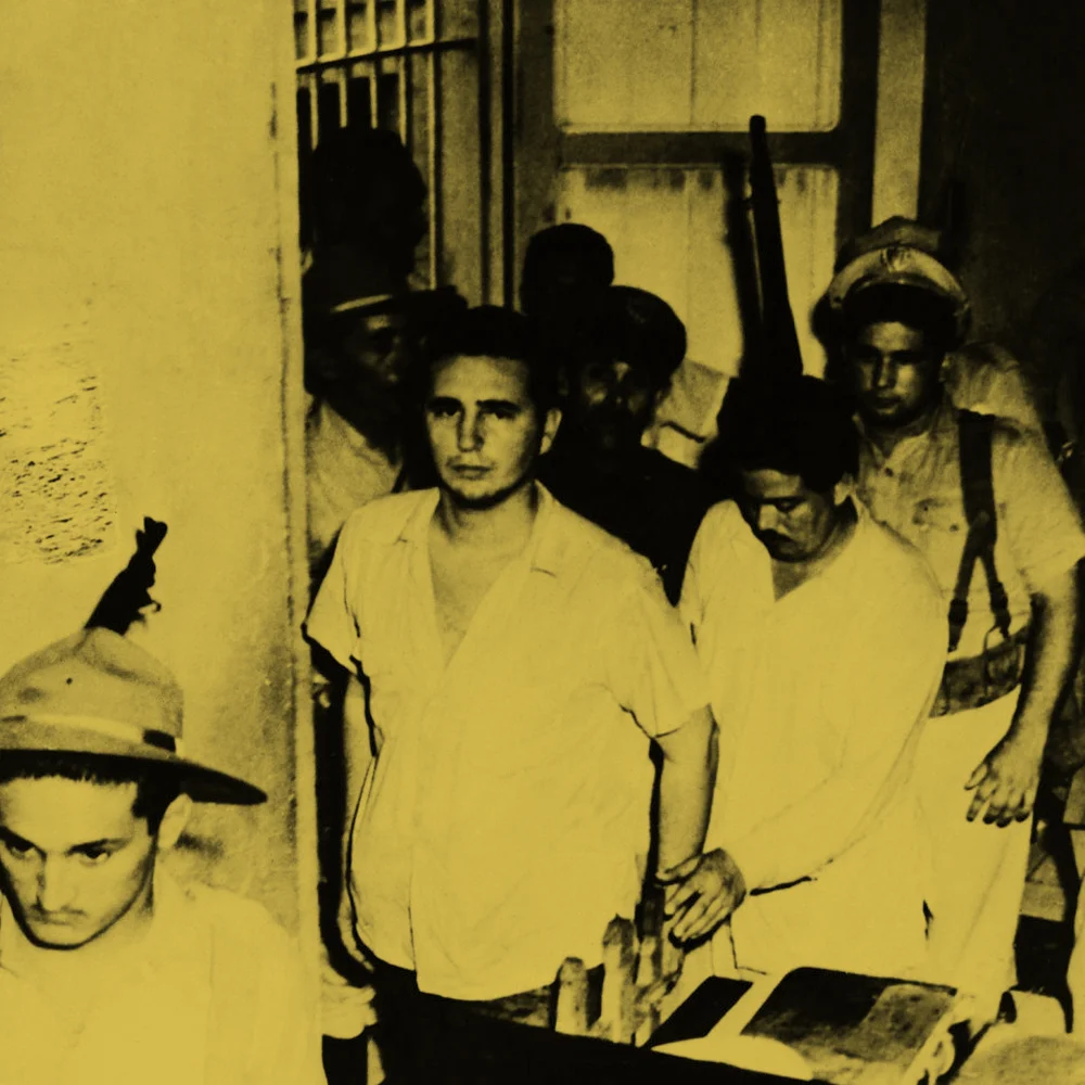 Fidel Castro under arrest as he heads for trial, where he gave his speech 'History will absolve me'.