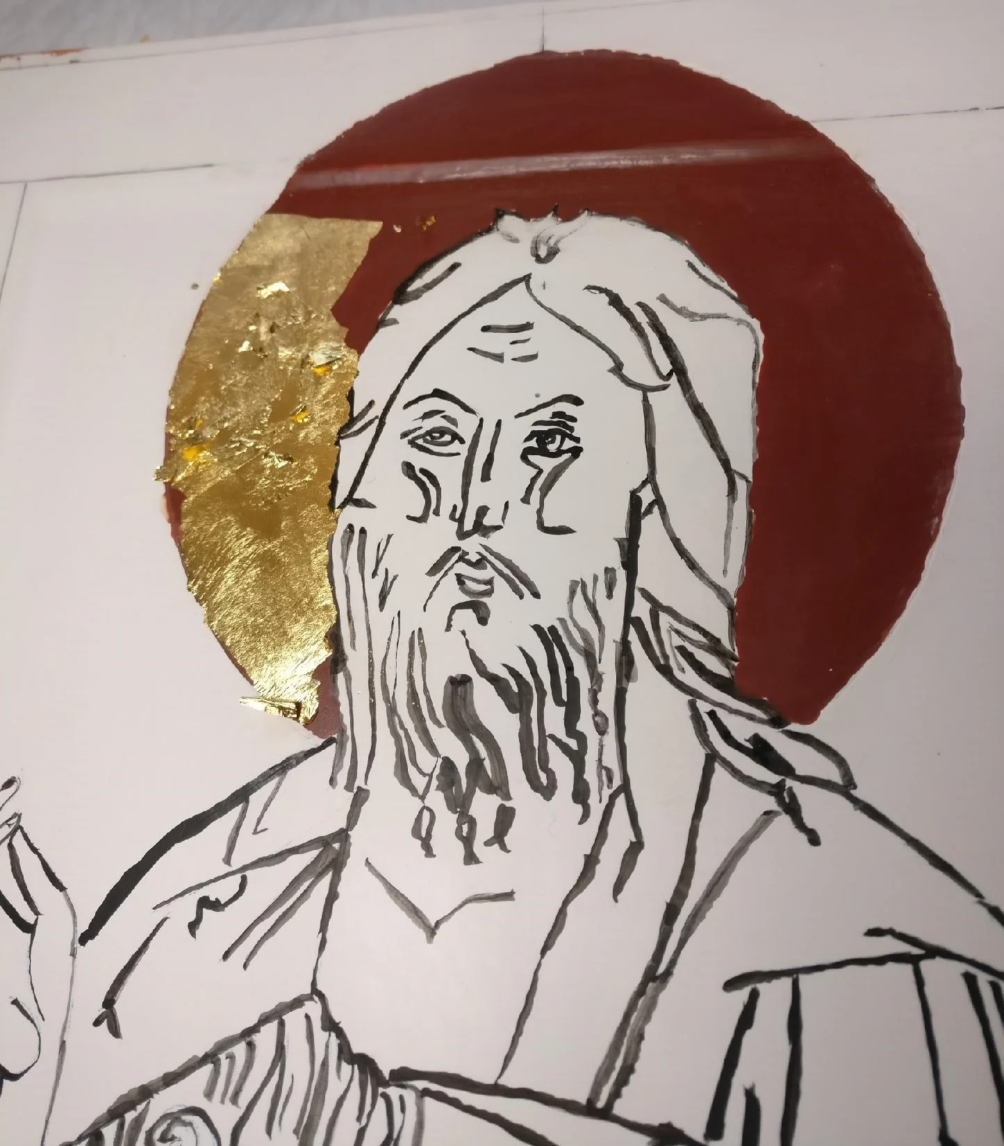 John the Baptist Icon, adding gold leaf on clay.