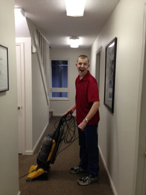  Bryan is very careful to make sure each area of the office gets vacuumed, including the hallways. 