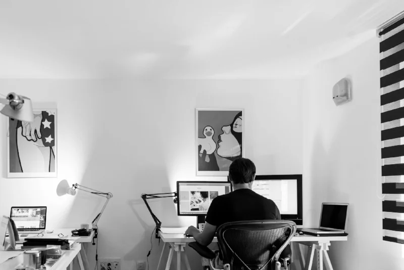 Assisted by voice-activated technology, a disabled Veteran works from home.