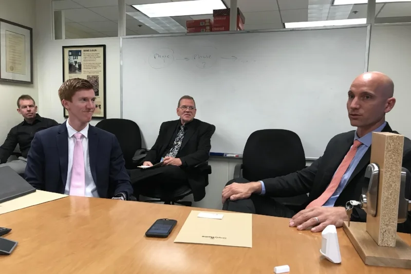 Simply Home's Chief Development Officer, Jason Ray (far right), demonstrates new outcomes with the technology developed by Simply Home.