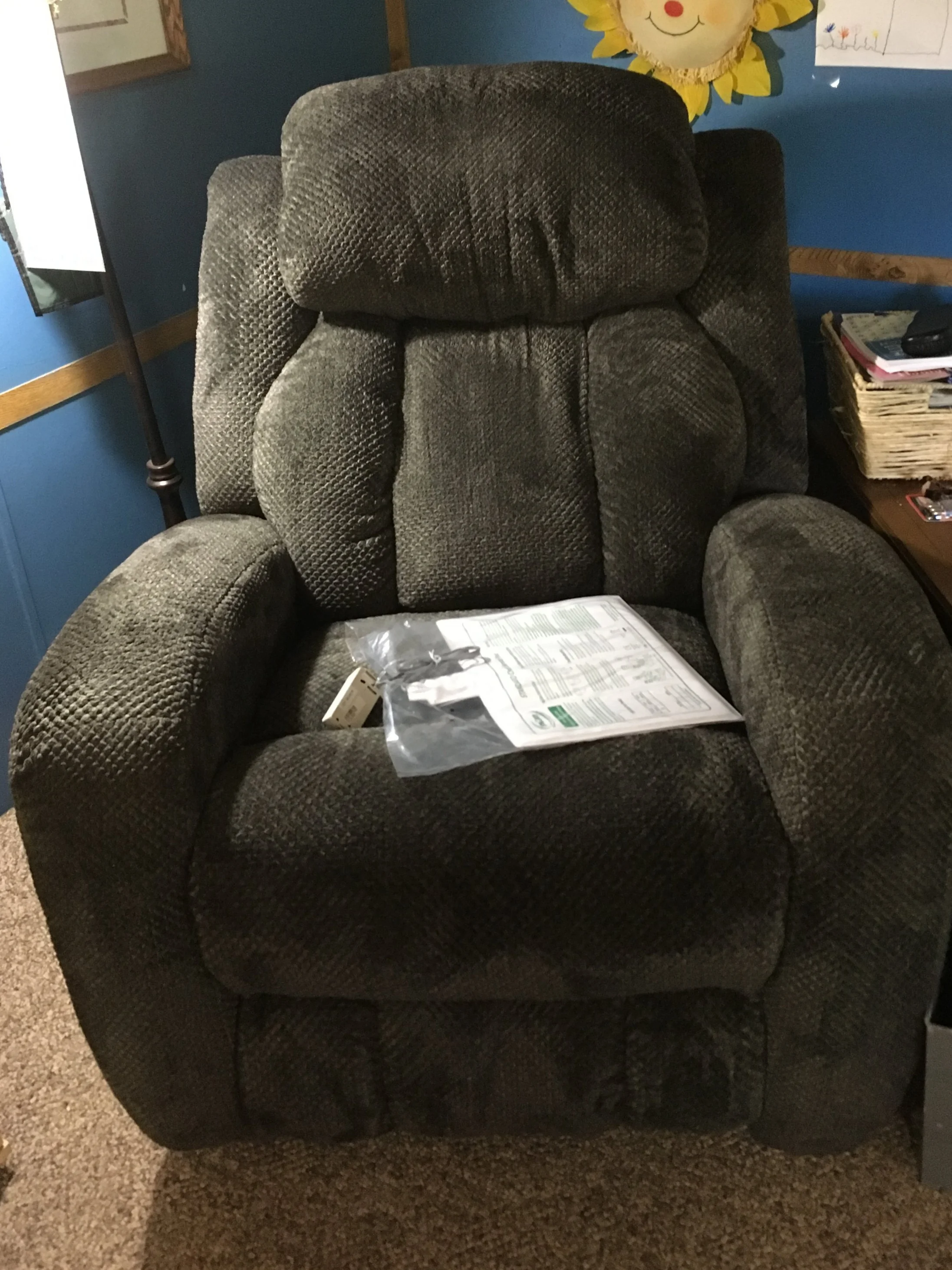 The wireless chair pad sits on the recliner. The pad’s sensor will relay information to the Simply Home base unit and send alerts if there are long periods of inactivity.