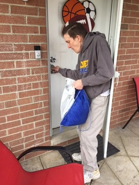  Dale using his Ring Doorbell. 