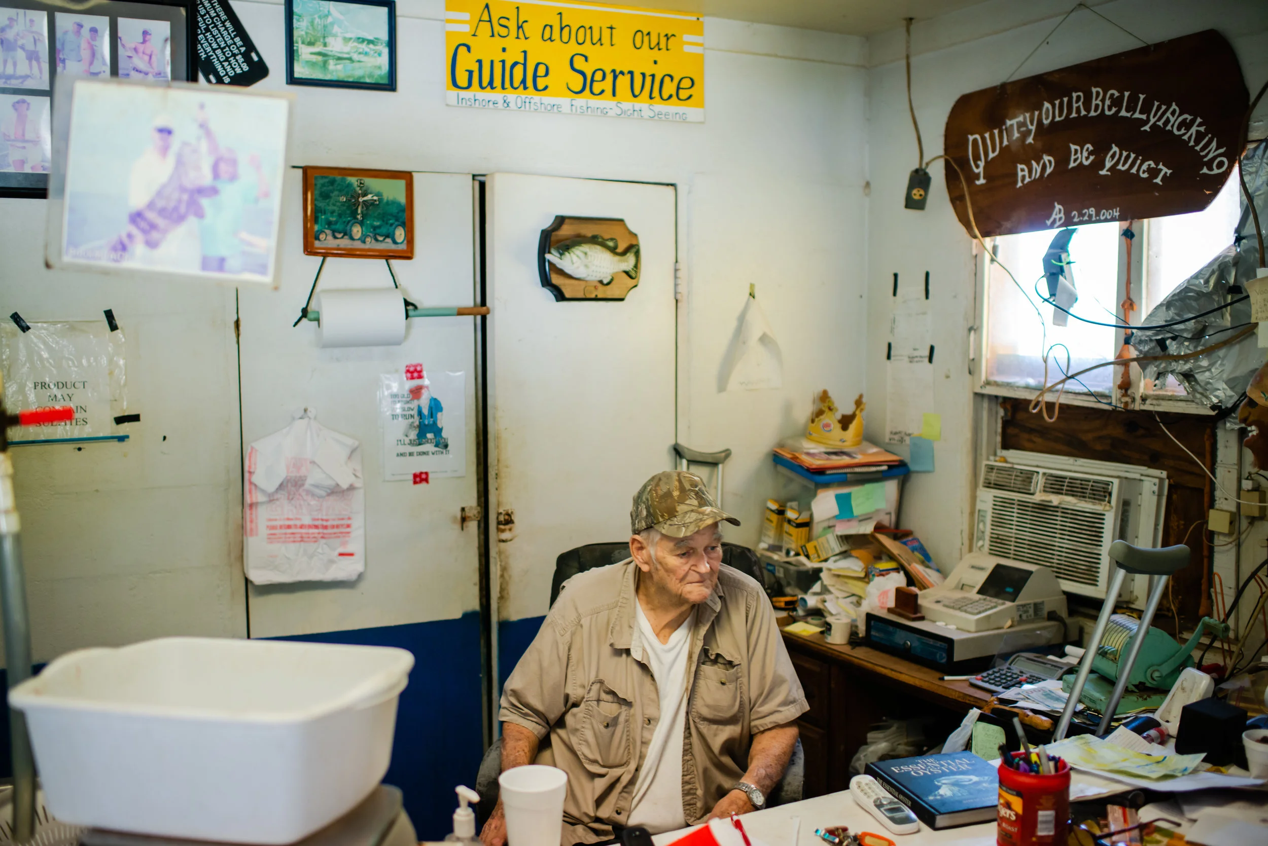 78 year old Harley Allen has been in the seafood business for 55 years, since 1978 he has owned and operated Allen’s Seafood. Allen’s Seafood used to buy oysters from a dozen boats and employ a team of oyster shuckers to process the quantity. His trucks would transport seafood around Florida. Today, the trucks are overgrown with weeds and the business is “something to get out of the house.” Only one oysterman, Denis Jones, still brings oysters. Allen’s seafood is one of the only wholesalers where it is still possible to buy Apalachicola oysters in Apalachicola.