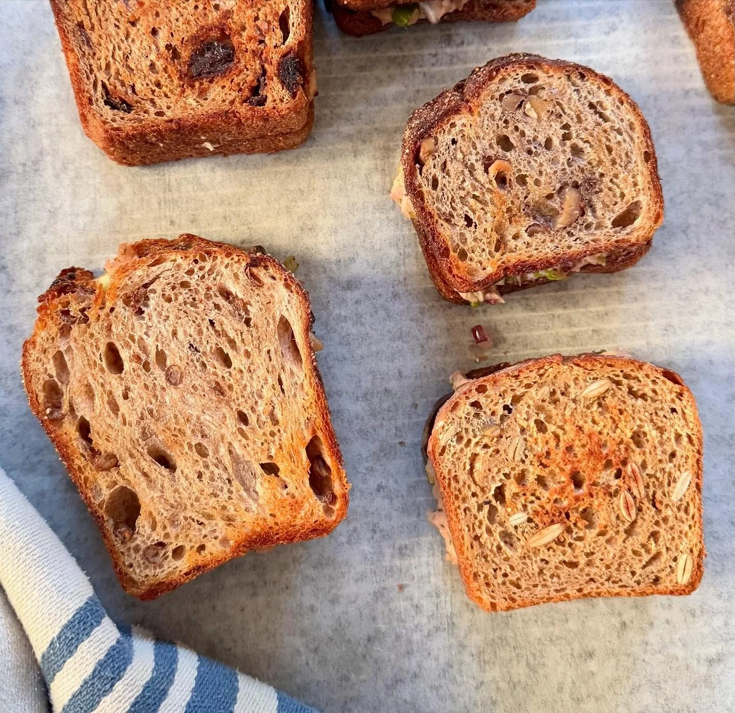 Headed to Kenton Market this afternoon, from 3 till 7. Come see us! Today&rsquo;s breads are 🌾Purple Karma Barley, 🌾Einkorn Pepita, 🌾Walnut Red Fife, 🌾Seeded Buckwheat with Plum and Fennel. Pic of tuna toasts made with a variety of mini breads fr
