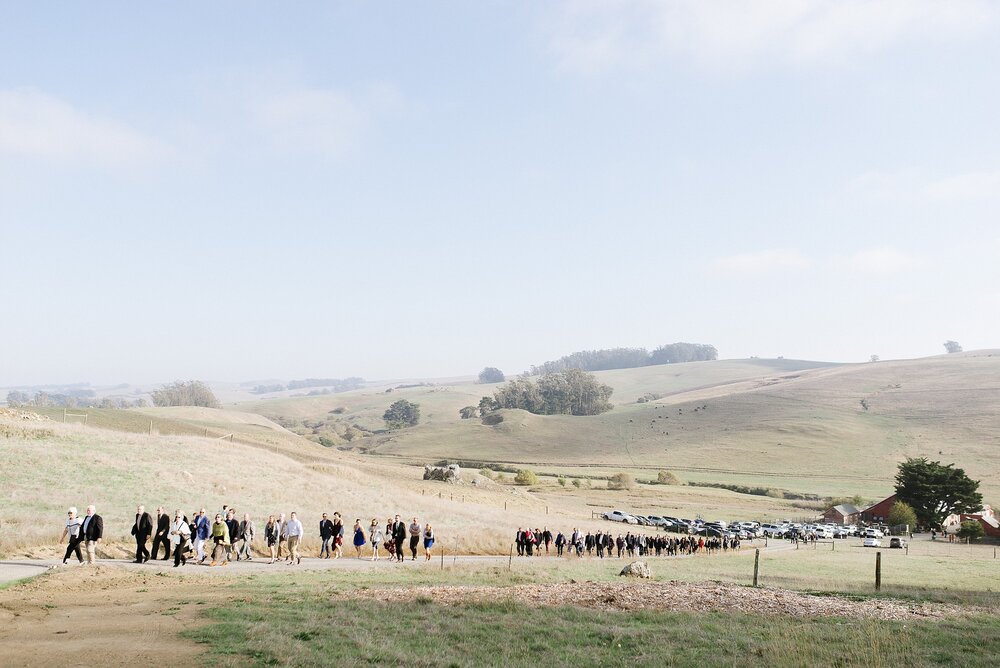 guests walking to ceremony at Stemple Creek Ranch