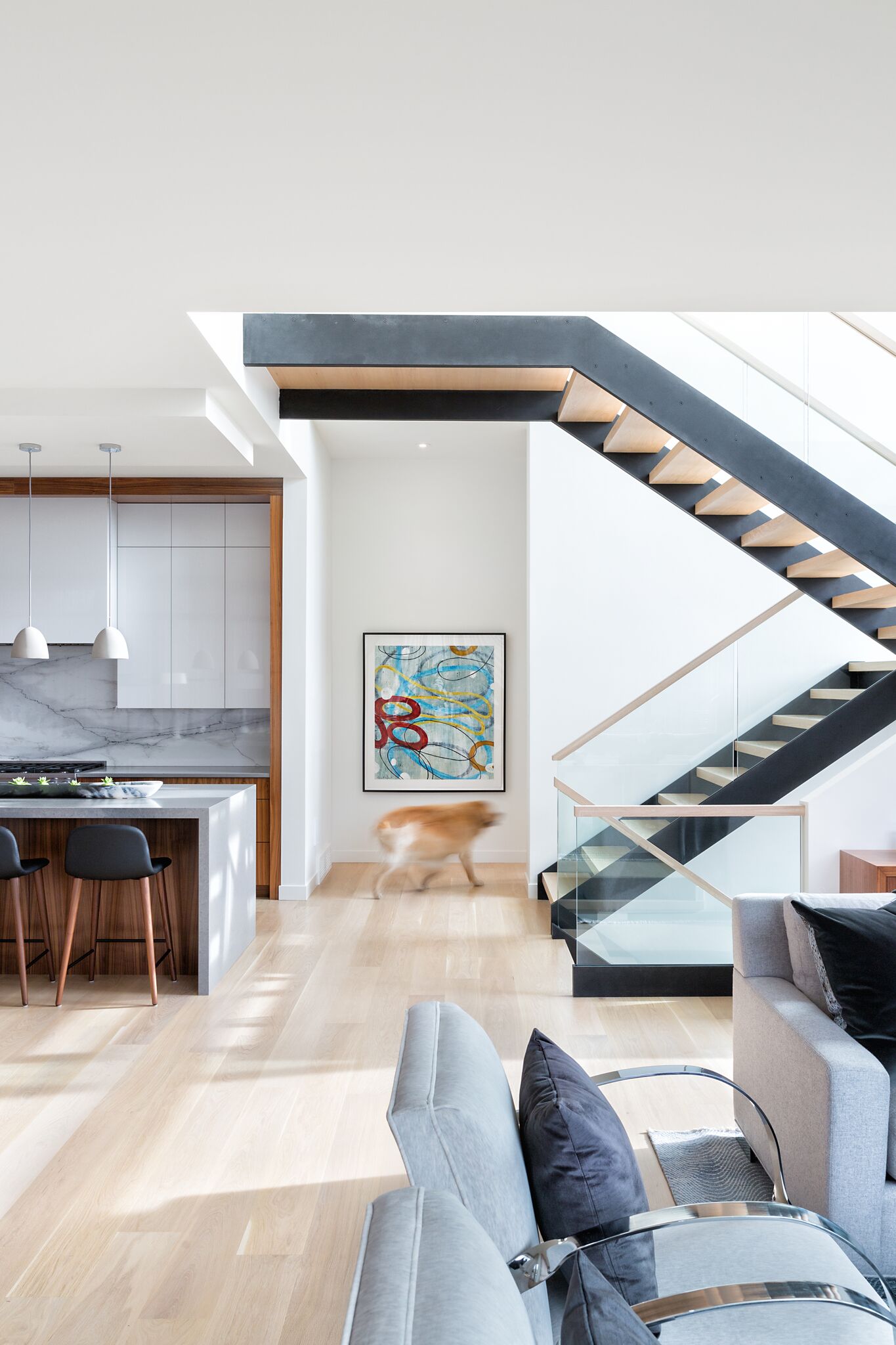 Kitchen and Staircase Views at Elbow Park Modern, Nyla Free Designs, Calgary Interior Designer, DeJong Design Associates, Insignia Custom Homes, Phil Crozier Photography