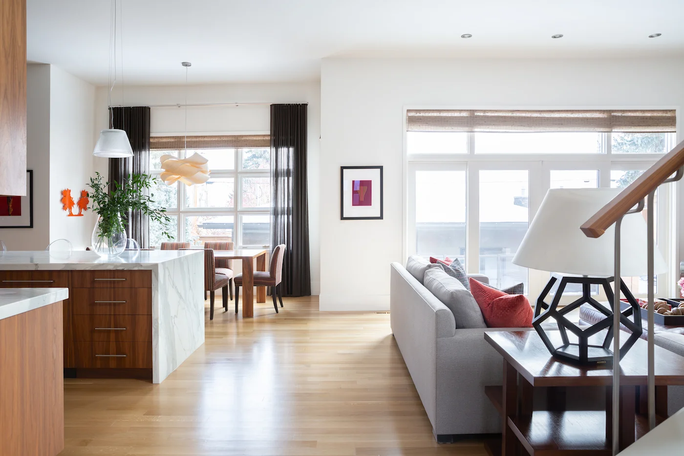 Views of kitchen, dining nook and living room of an Elbow Park Residence, Interior Design by Calgary Design Studio: Nyla Free Designs, Photography: Phil Crozier #nylafreedesigns #nfdielbowparkluxe #kitchendesign #designinspirations
