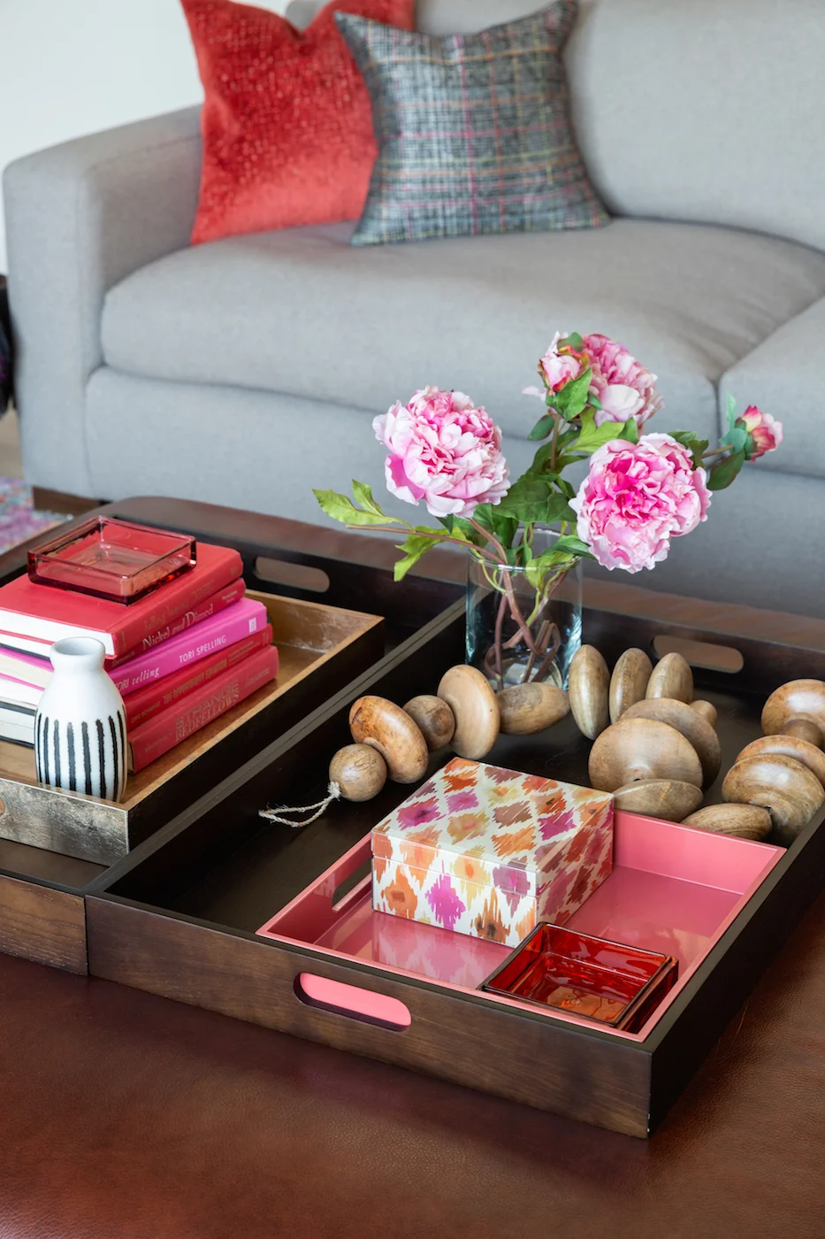 Detail shot of styled coffee table within the Living room of an Elbow Park Residence, Interior Design by Calgary Design Studio: Nyla Free Designs, Photography: Phil Crozier #nylafreedesigns #nfdielbowparkluxe #livingroomdesign #designinspirations #s