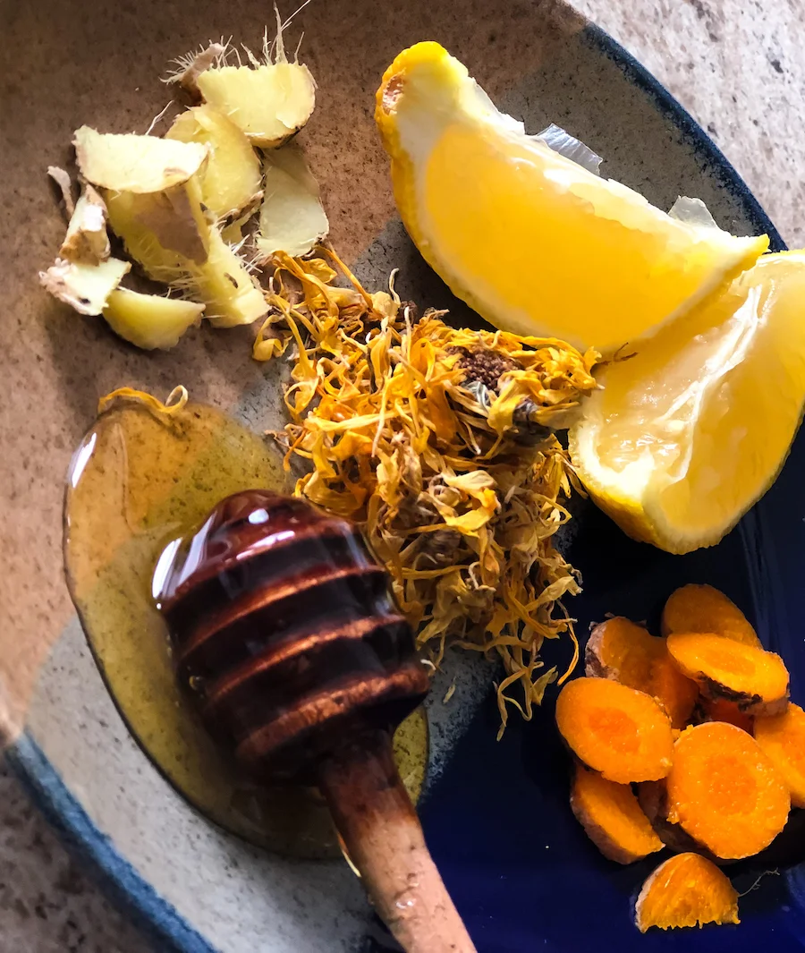 Fresh Ginger Root, Lemon, Calendula Petals, Honey, and Fresh Turmeric Root