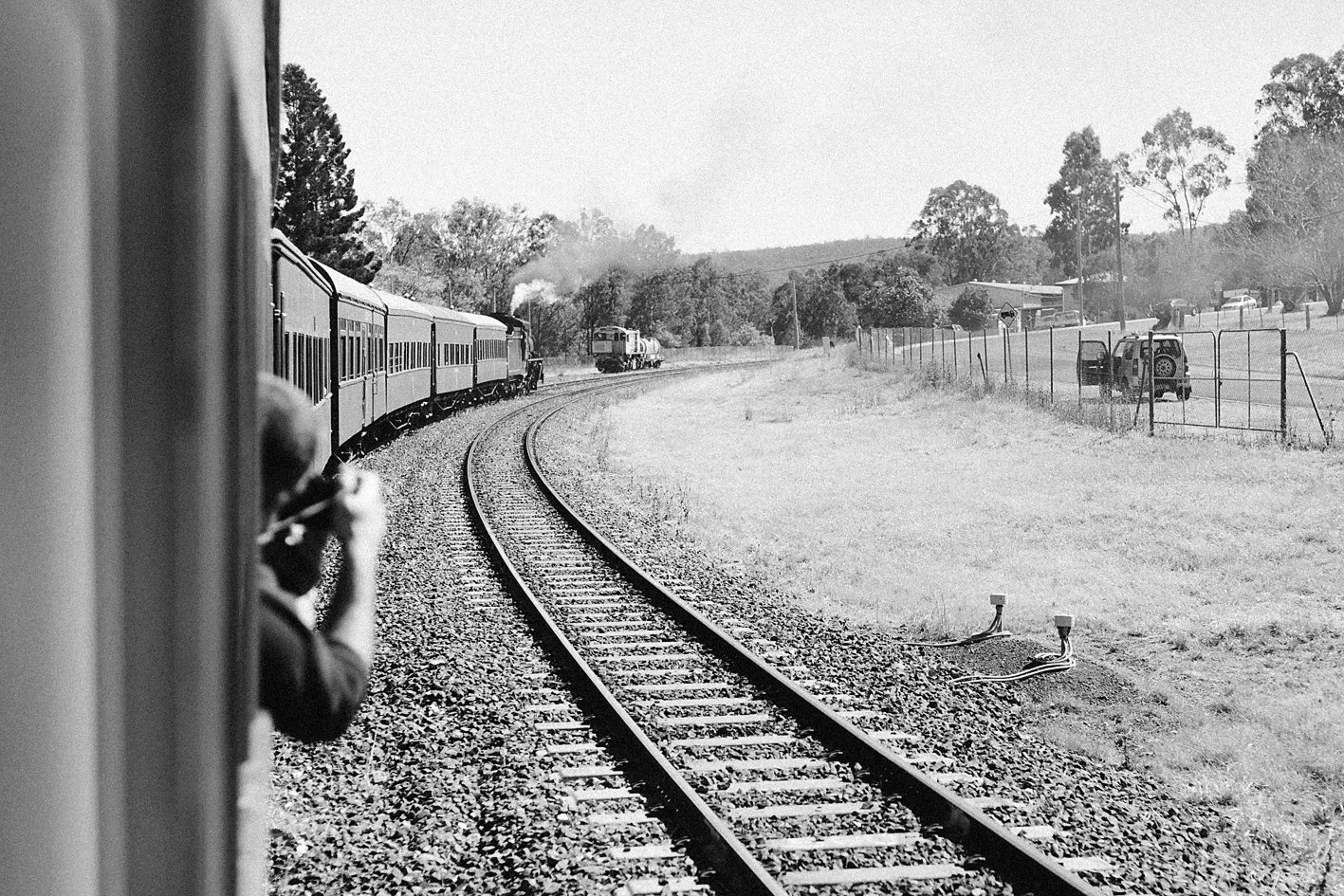 The car shown above was just one of many to line the tracks and watch the train go by :-)