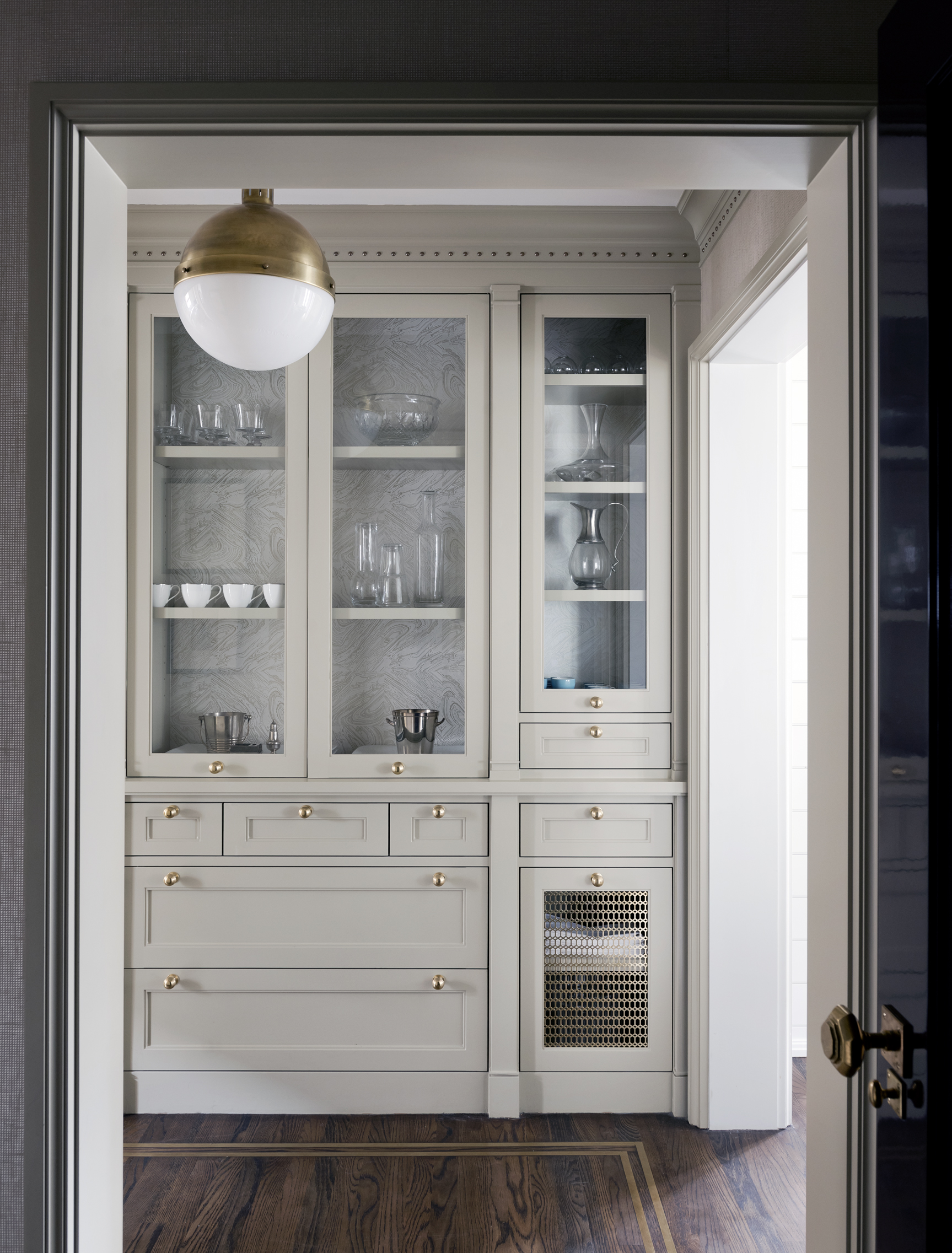 There's a lot to love about this space, but if I had to choose just one detail, it'd be that inlaid brass border! To die for.