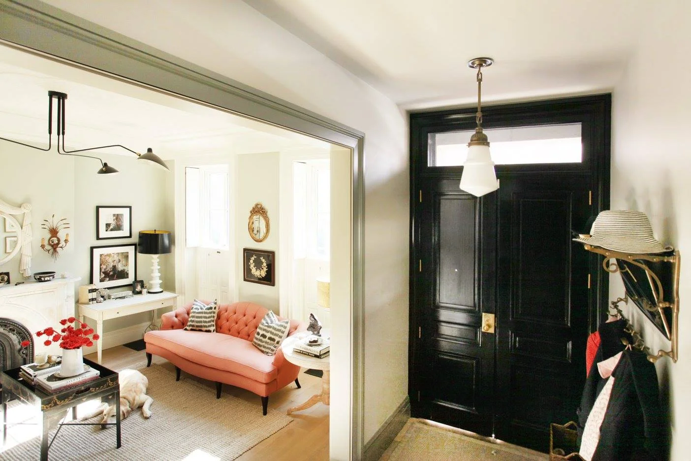 A brass train rack, like the one used above as an entry catchall, is a nice alternative to boring hooks. I spy one of my favorite Urban Electric fixtures !