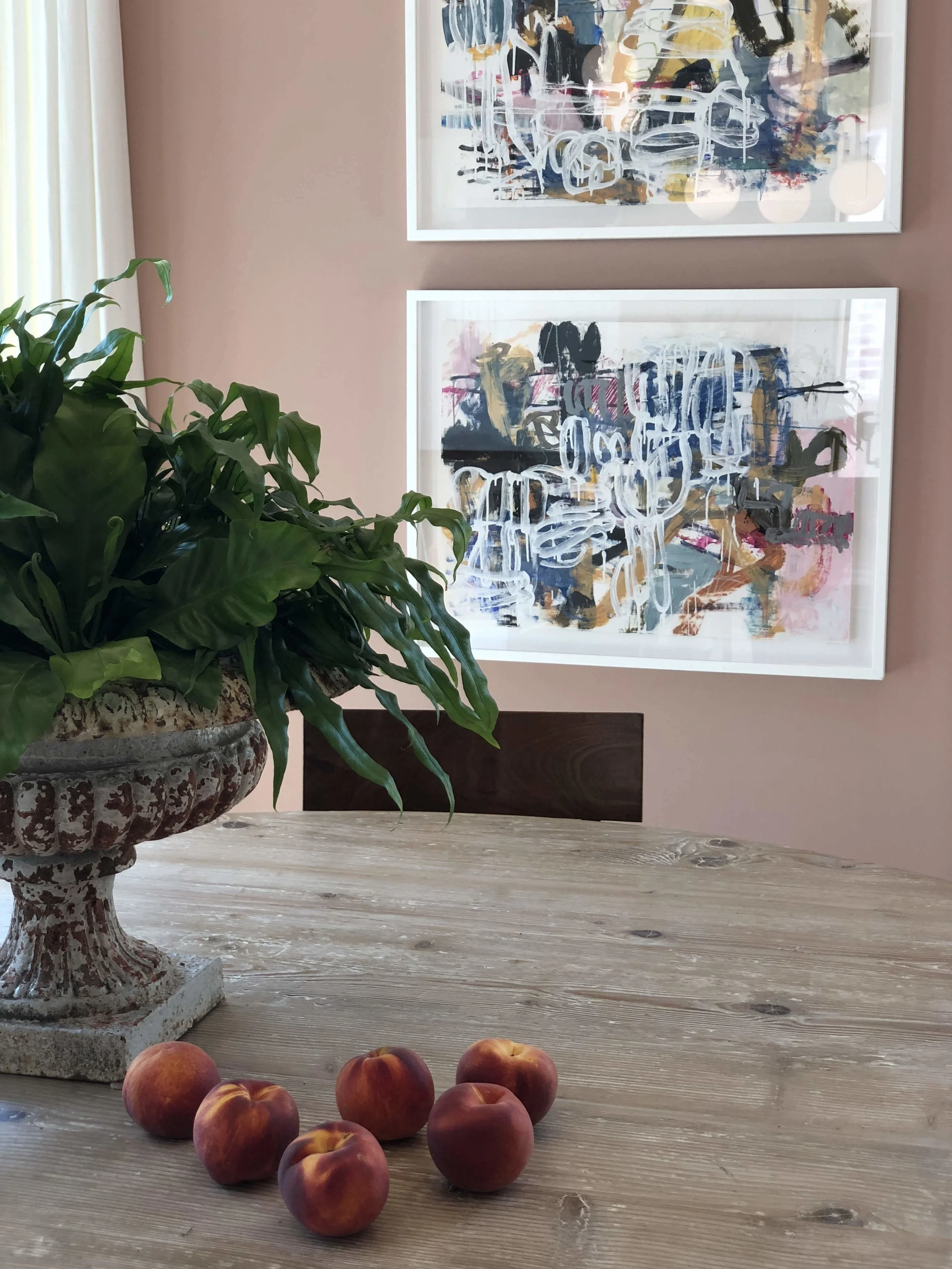 Amazing dusty pink dining room by Meg Lonergan.