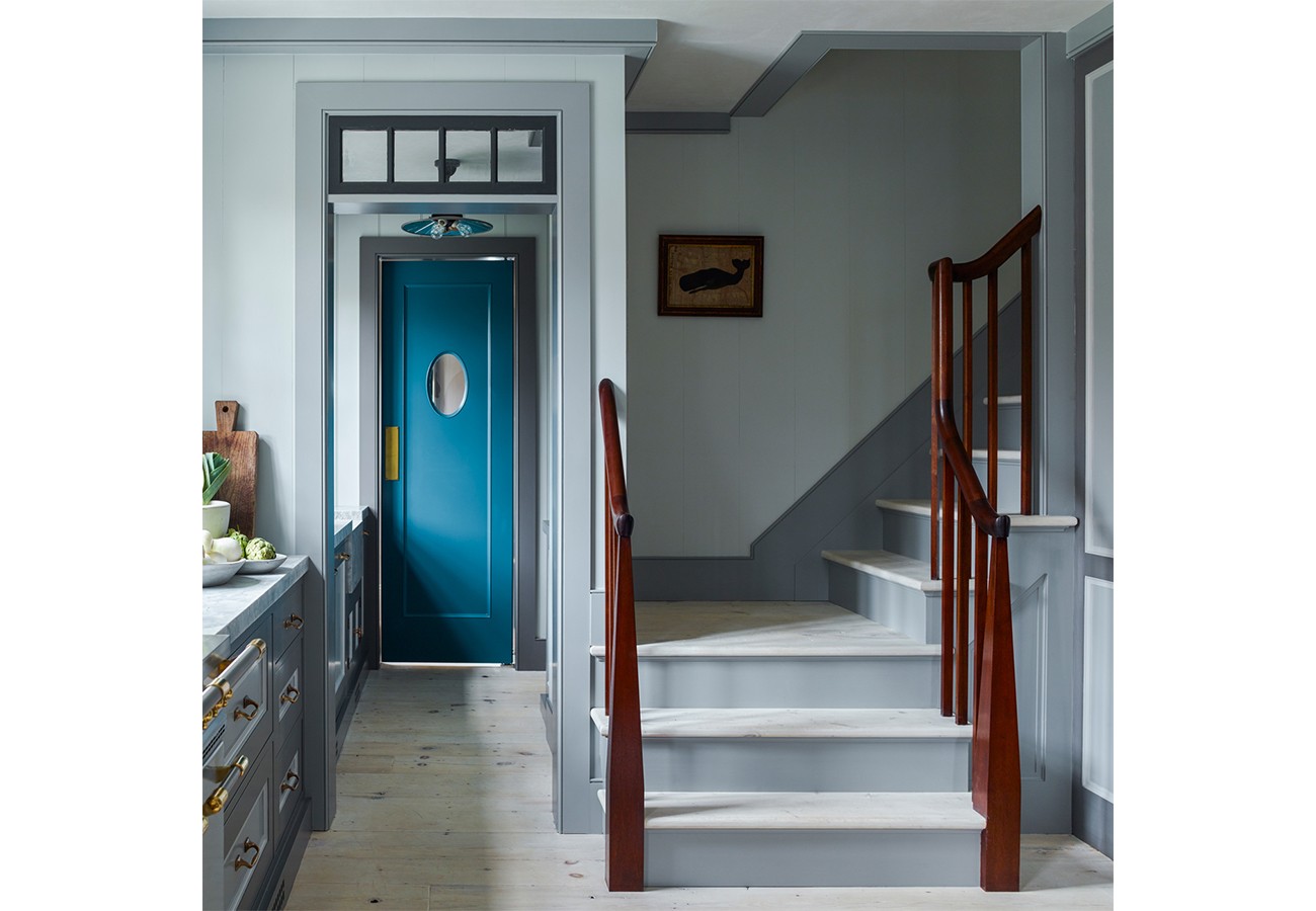 A pop of teal in a world full of “whale gray,” as my family calls this color. Made even more appropriate by Mr. Whale in the stairwell.