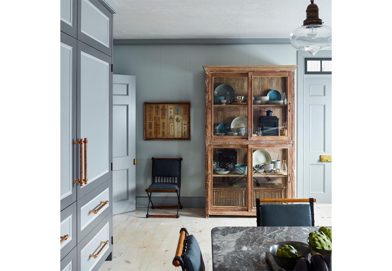 It’s really hard to pick here. The two-toned cabinetry, those CHAIRS, the distressed display cabinet, the COLORS.