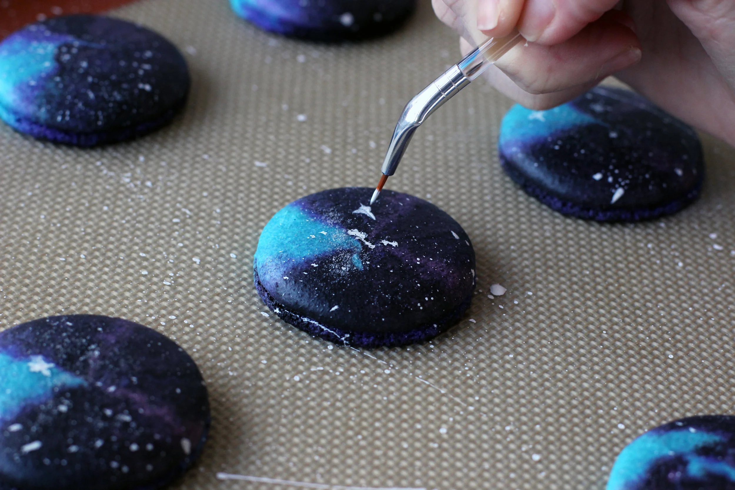 Step 5.2: Paint stars on the macarons.