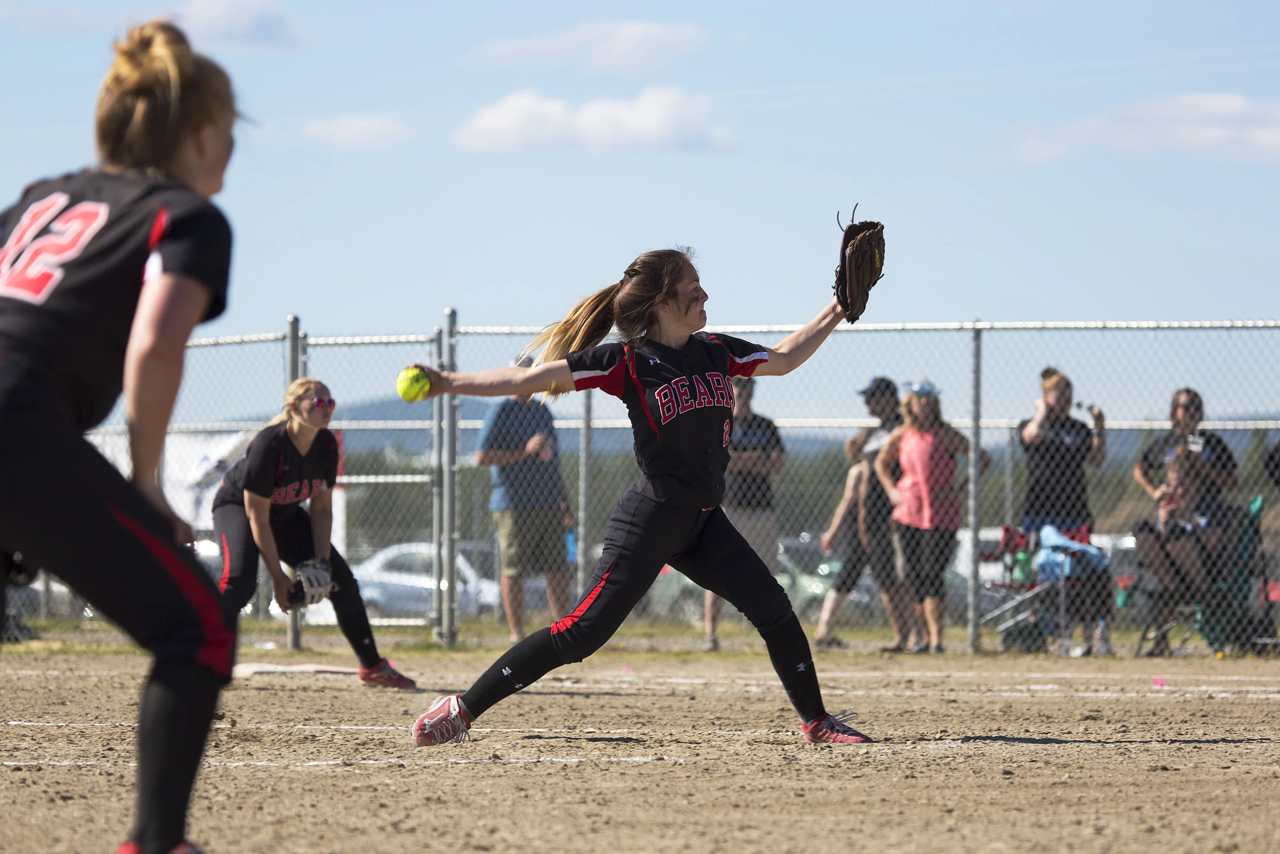 Juneau Douglas, Elisa Fabrello (2) winds up to pitch for the finals for the State Championship Softball game on Saturday, June 3rd against Thunder Mountain in the South Davis Park Complex in Fairbanks, AK. Sarah Manriquez/ Juneau Empire