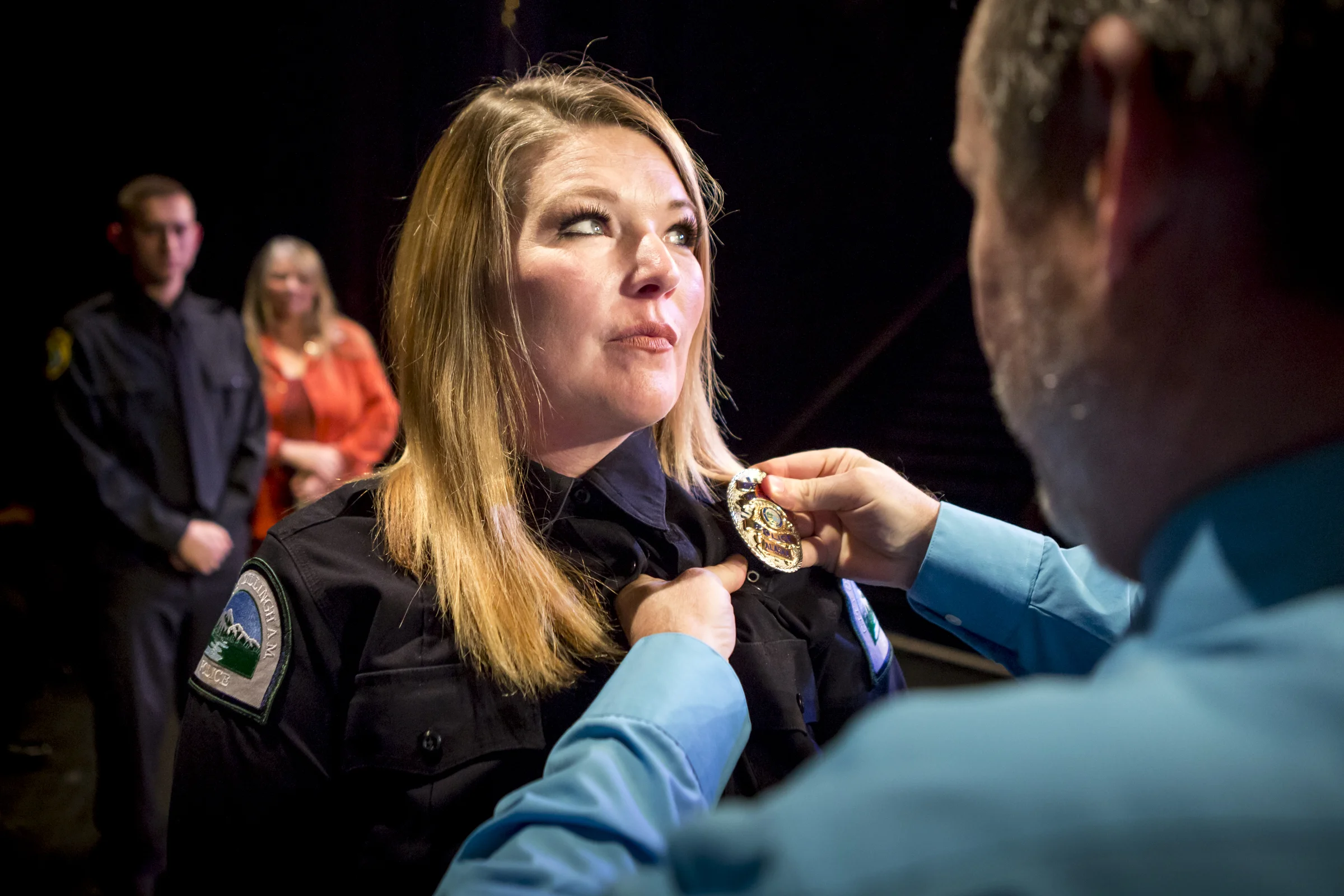 Susan (Suzi) Newman receives her badge during the pinning ceremony at the Community and Technical College Police Academy graduation on Friday, October 12th, 2018.