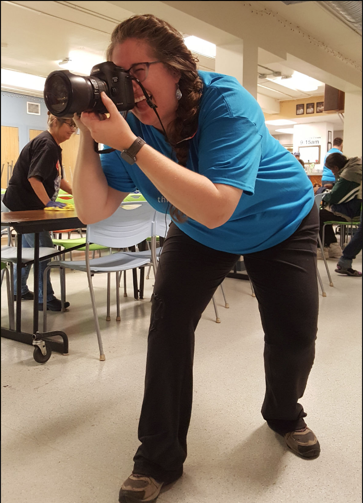 Sarah Manriquez takes portraits of participants in the Through Our Eyes program Friday morning during breakfast at the Stone Soup Cafe. Manriquez is using the effort to tell stories of homeless Fairbanks residents as they see their lives through the