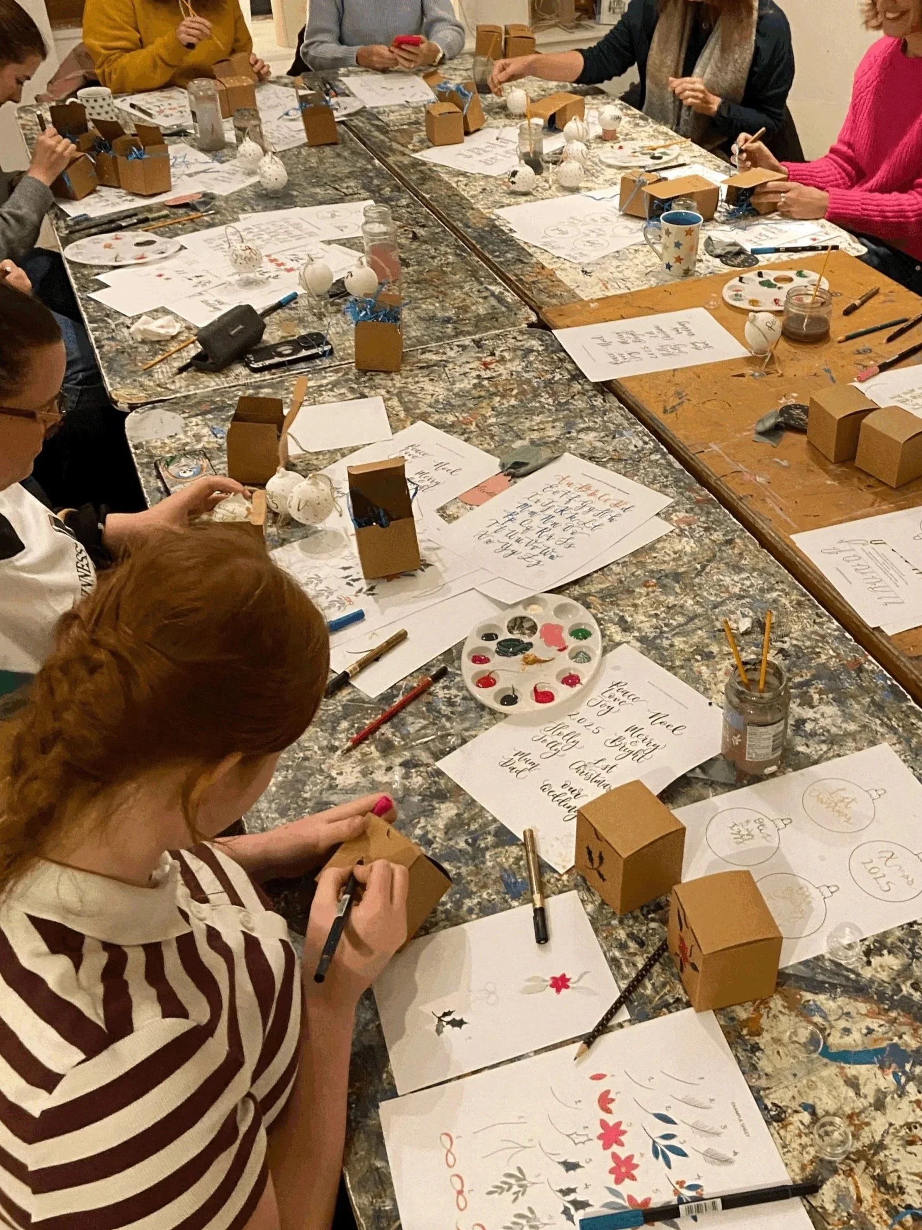 Christmas bauble personalising and decorating workshop in progress in Brighton