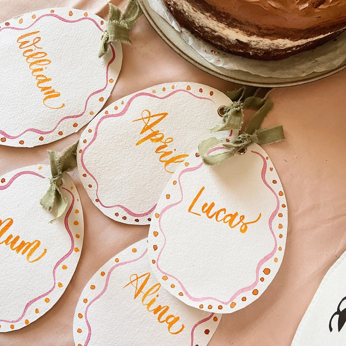 I hope you&rsquo;re all having a lovely Easter Sunday 💛

These place cards were a last-minute idea - I cut egg shapes from cotton paper, added a soft watercolour border, and finished with egg-yolk coloured lettering. It felt so nice to get the brush