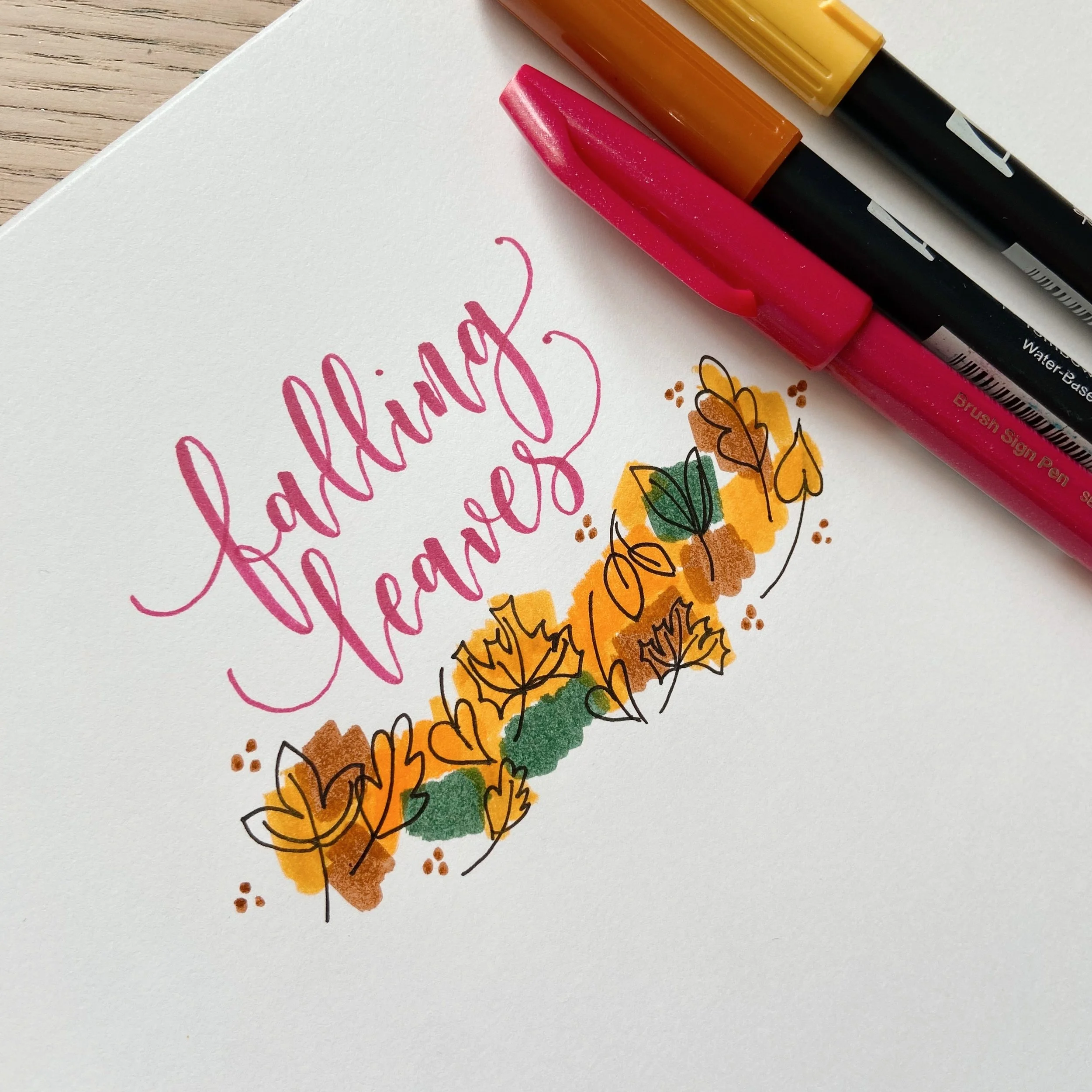 Kids learning brush calligraphy in a fun, creative class