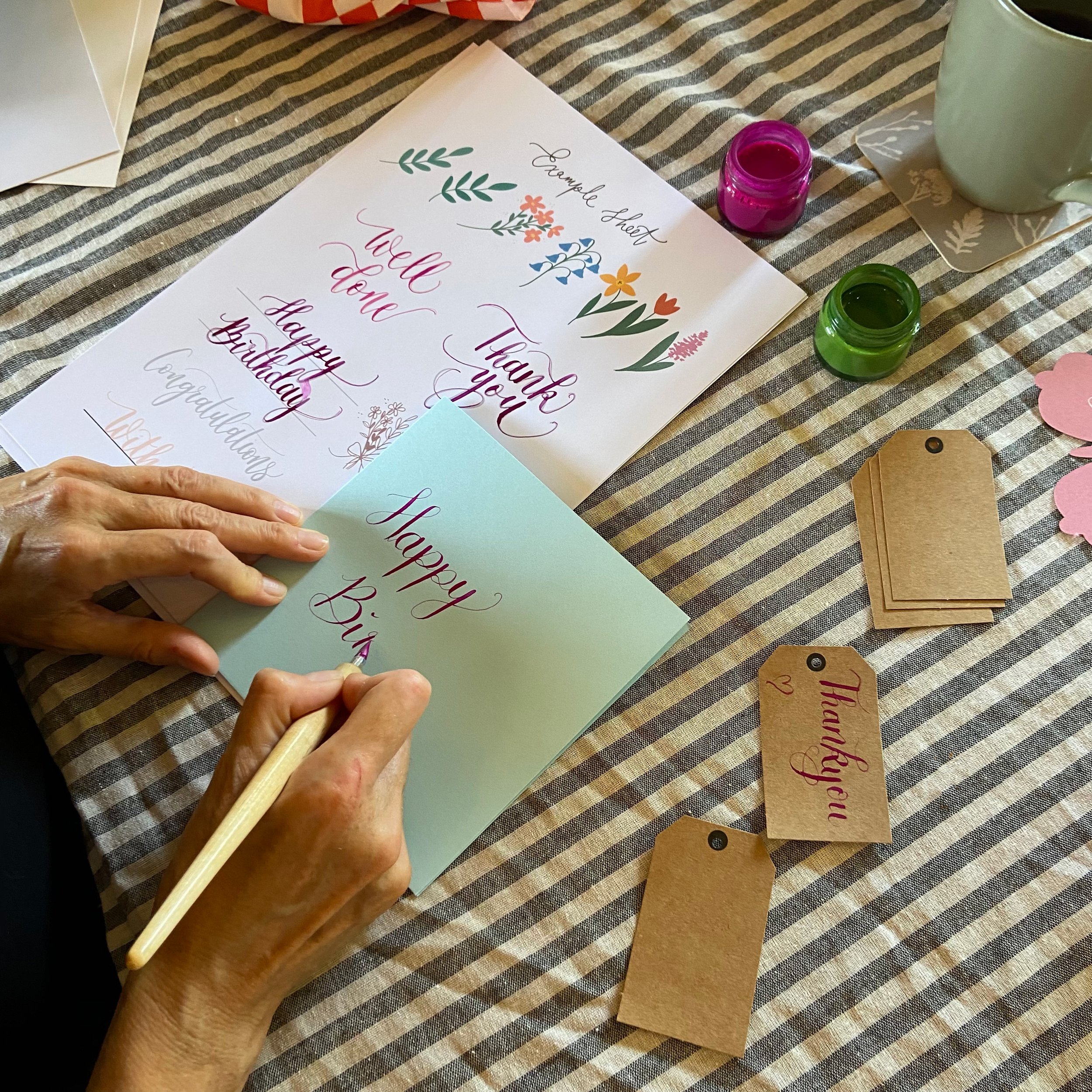 Handmade cards and gift tags featuring elegant modern dip pen calligraphy