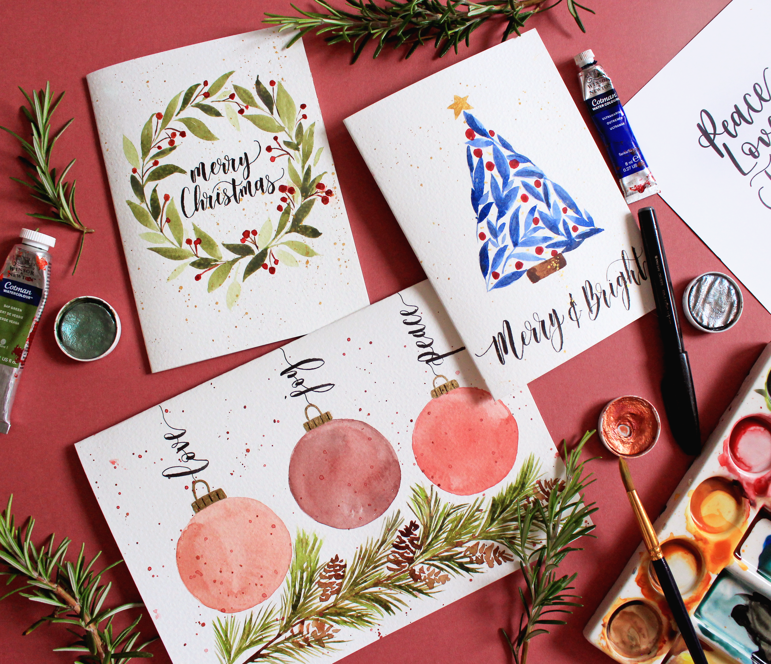 Modern brush calligraphy Christmas greeting on a handmade festive card.