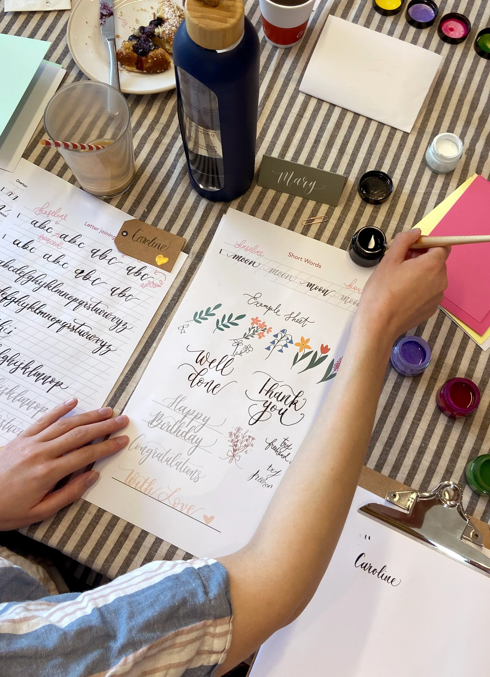Hand-lettered greeting cards and gift tags created using dip pen calligraphy.