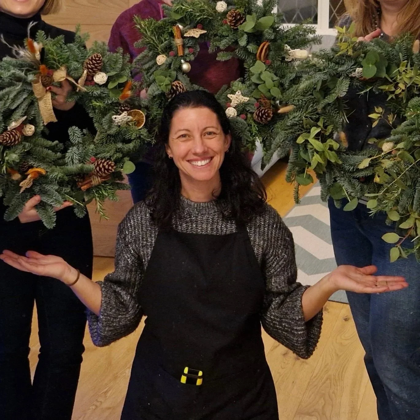 Tash teaching a Christmas wreath-making workshop in East Sussex