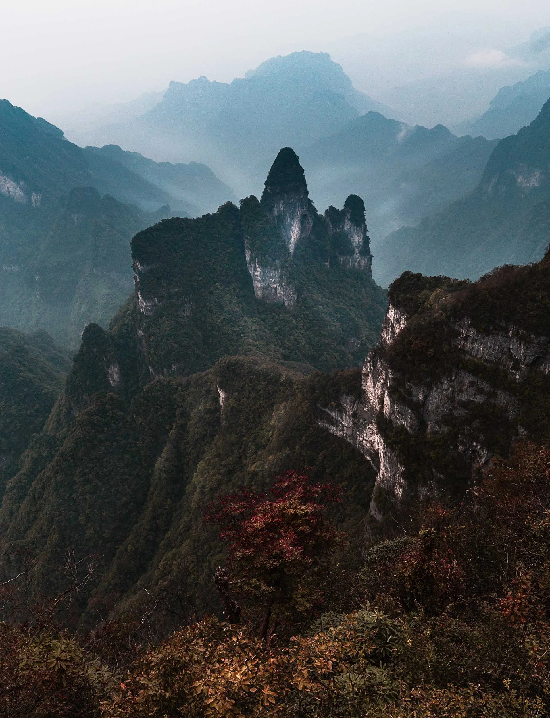 Autumnal, misty mountain scenery of Tianmen Mountain National Park in Zhangjiajie, China.