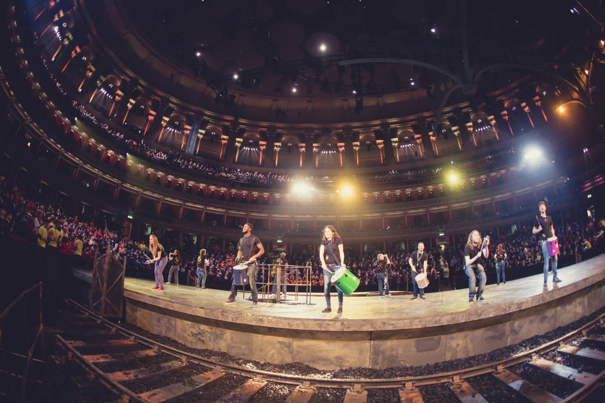 Inspire-works Facilitators leading 1,675 children in the successful Guinness World Records attempt for the largest samba band at the Royal Albert Hall!
