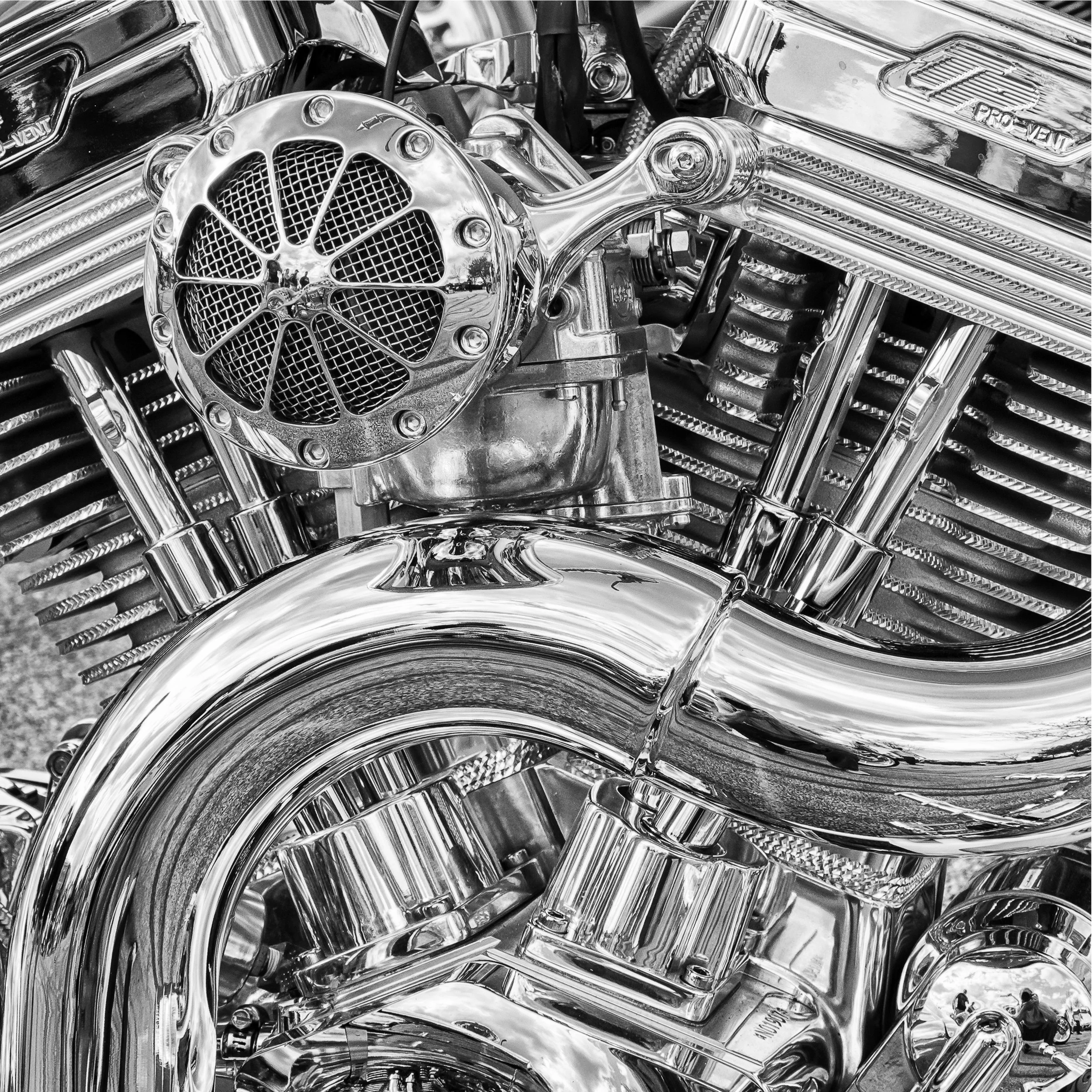 Black and white abstract detailed shot of a motorcycle image. Copyright Bill McSherry.