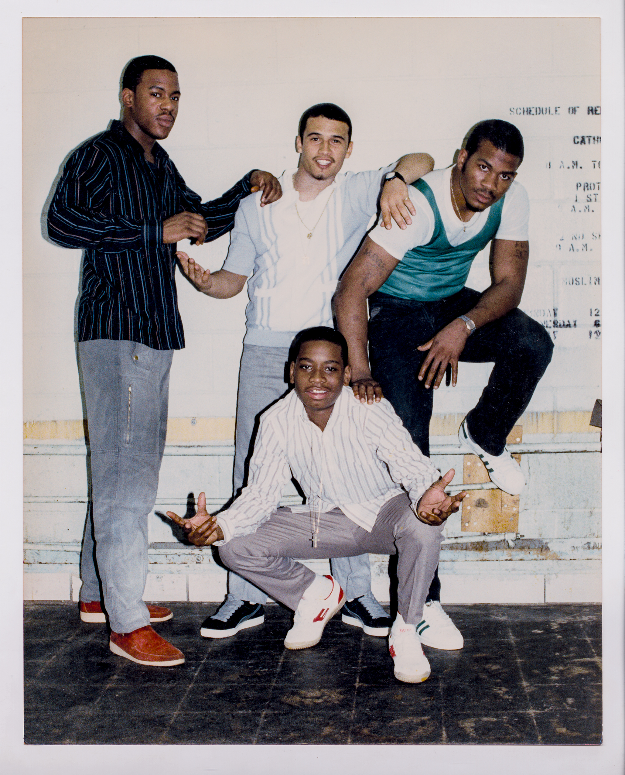  Jamel Shabbaz , Pretrial detainees all part of the “House Gang” (sanitation workforce) pose in the day room of their housing area, Rikers Island, 1986 