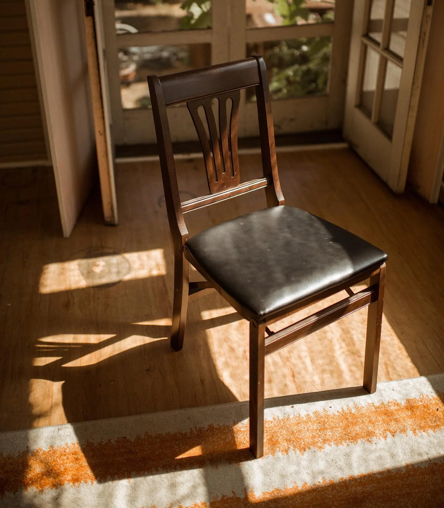 One of my photo friends from college often took photos of empty chairs. It really caused me to stop and consider the space that chairs hold, and the presence that they quietly possess. The way objects interact with us when not in use speaks to the hi