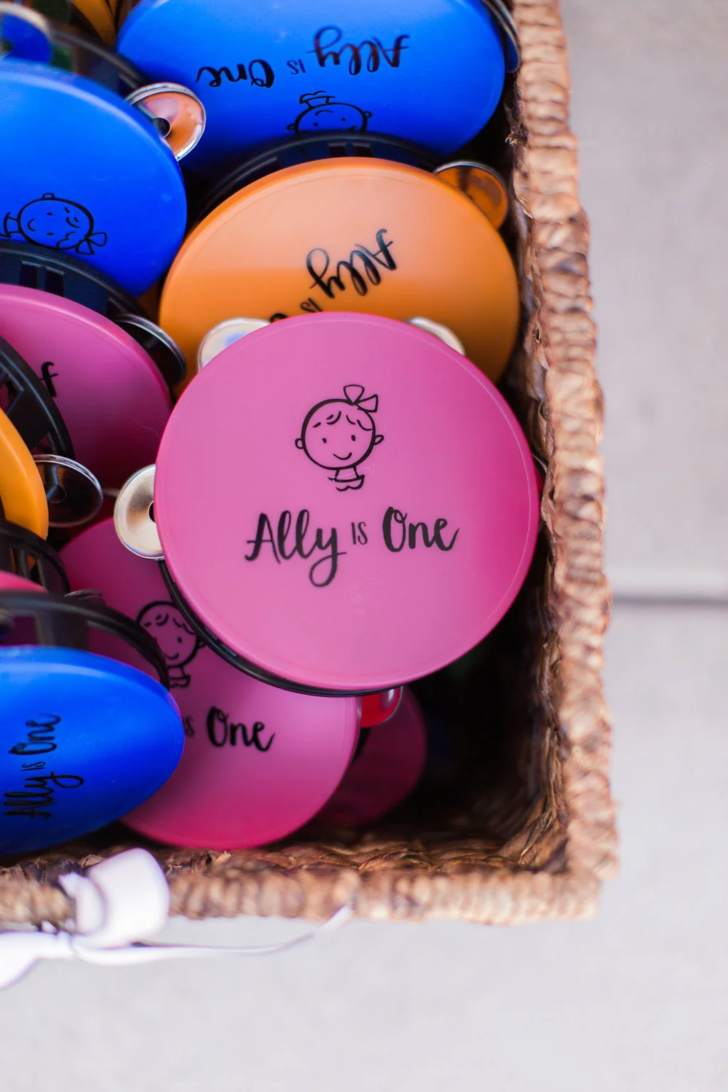 Bright, personalized tambourines served as party favors. Adorable!