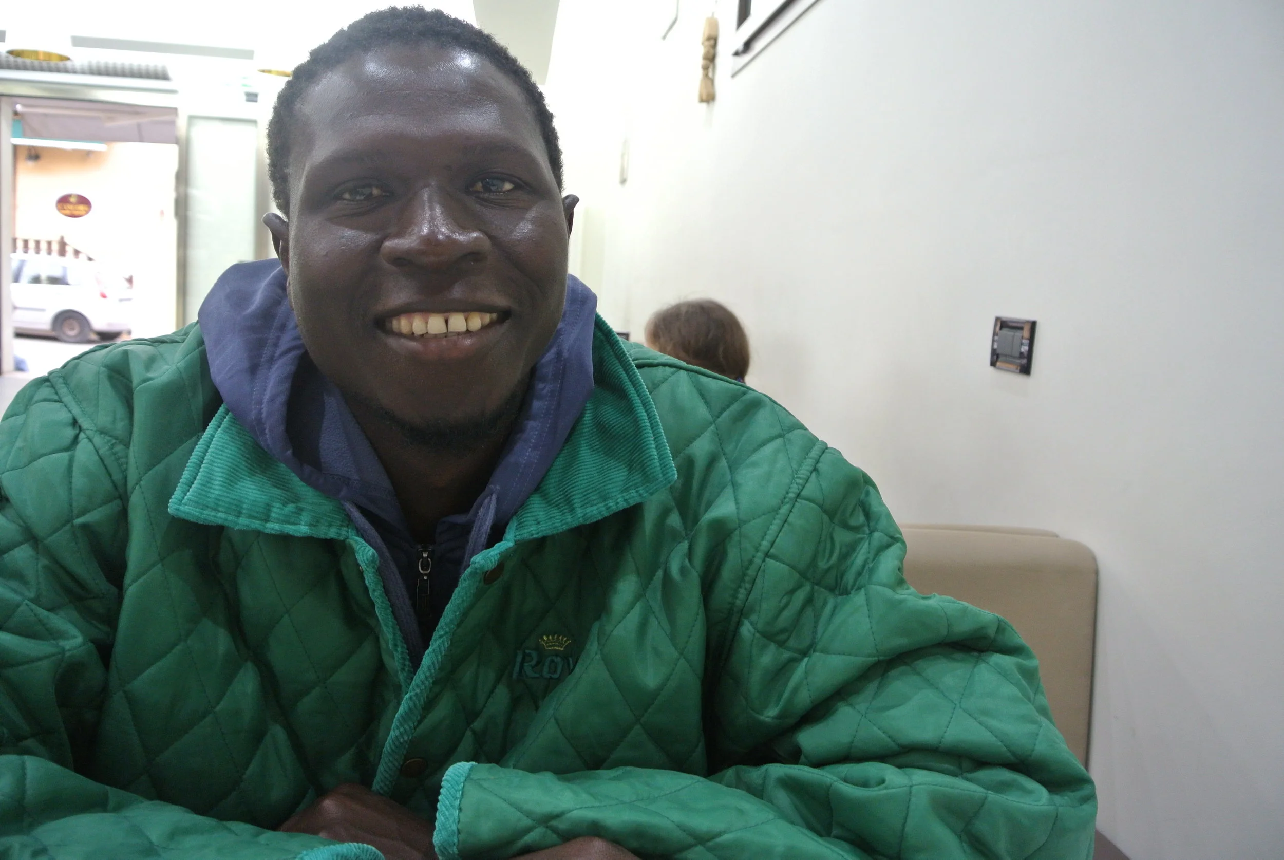 Alagie on Lampedusa island, days after his rescue at sea. Lampedusa, Italy; December 2017. ©Pamela Kerpius
