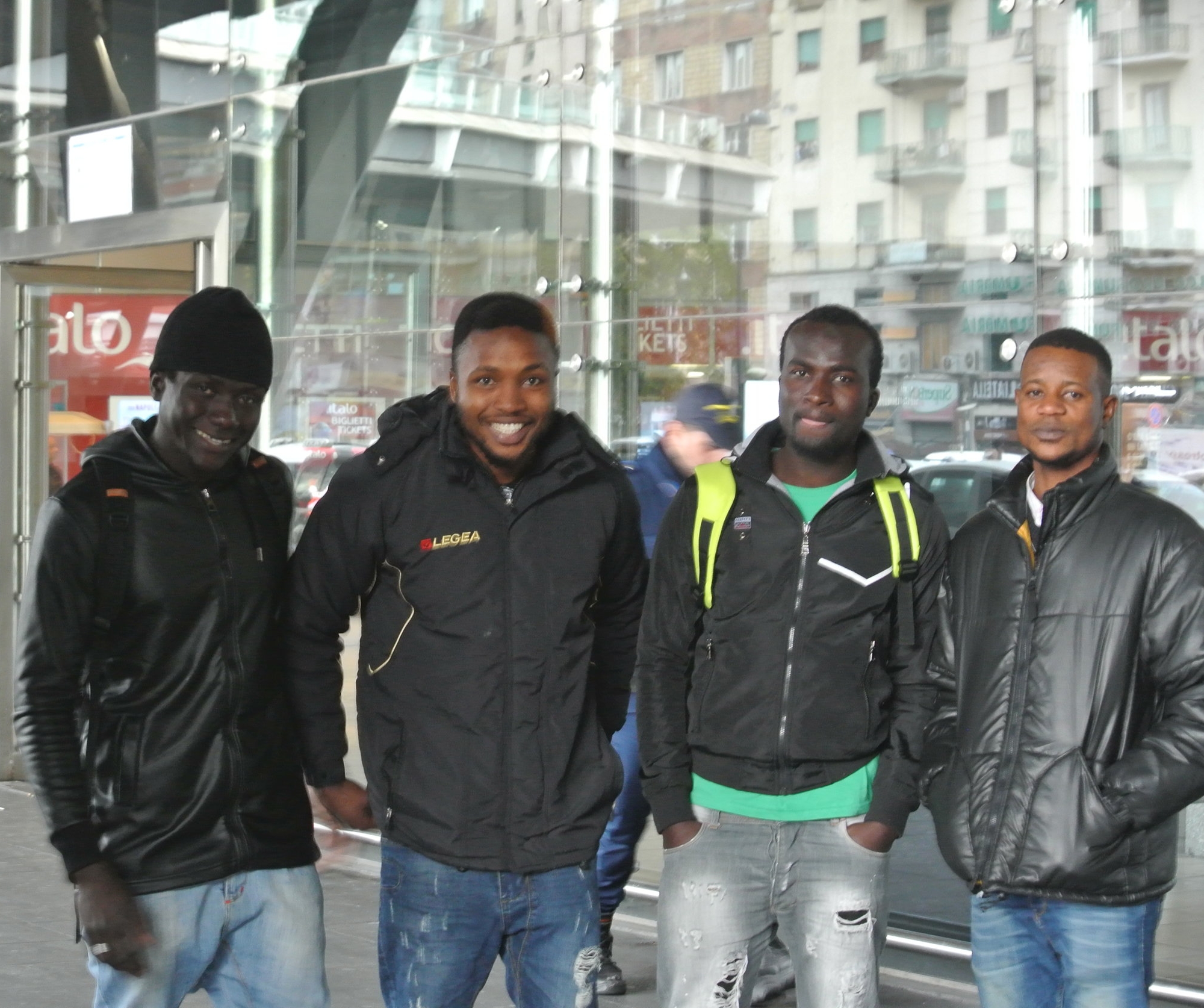  Left to right: Jamilu (20, Gambia),  Fabulous  (25, Nigeria), David,  Emmanuel  (21, Nigeria), at  Napoli Centrale  railway station. November 2017. 