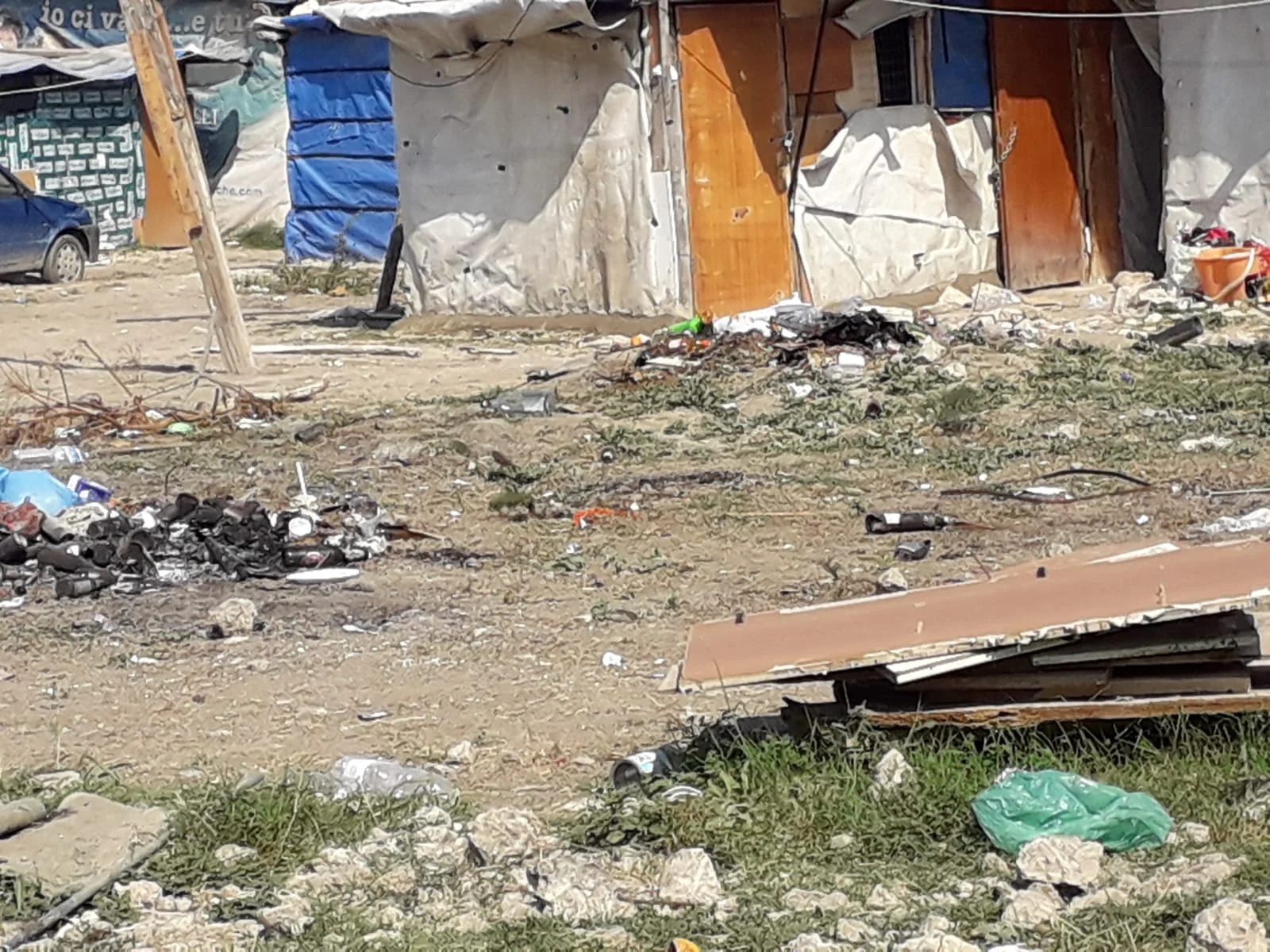 The grounds of a migrant shantytown near Foggia, Italy. July, 2018. © 2018 Pamela Kerpius