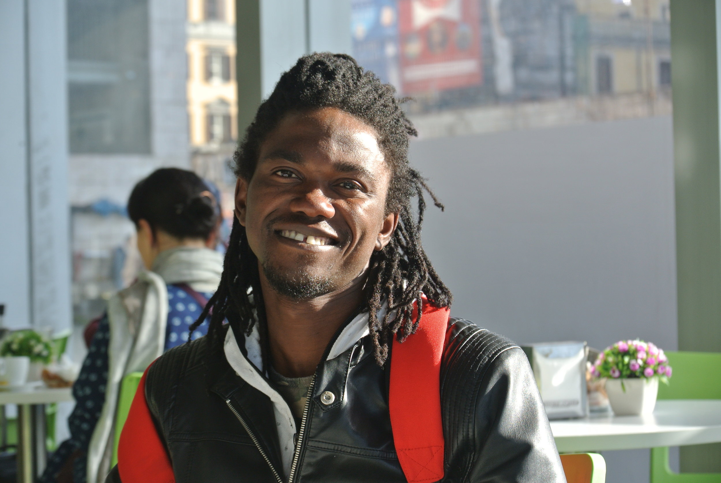   At a cafe at Roma Termini train station. Rome, Italy; 15 March 2019. ©Pamela Kerpius/Migrants of the Mediterranean  