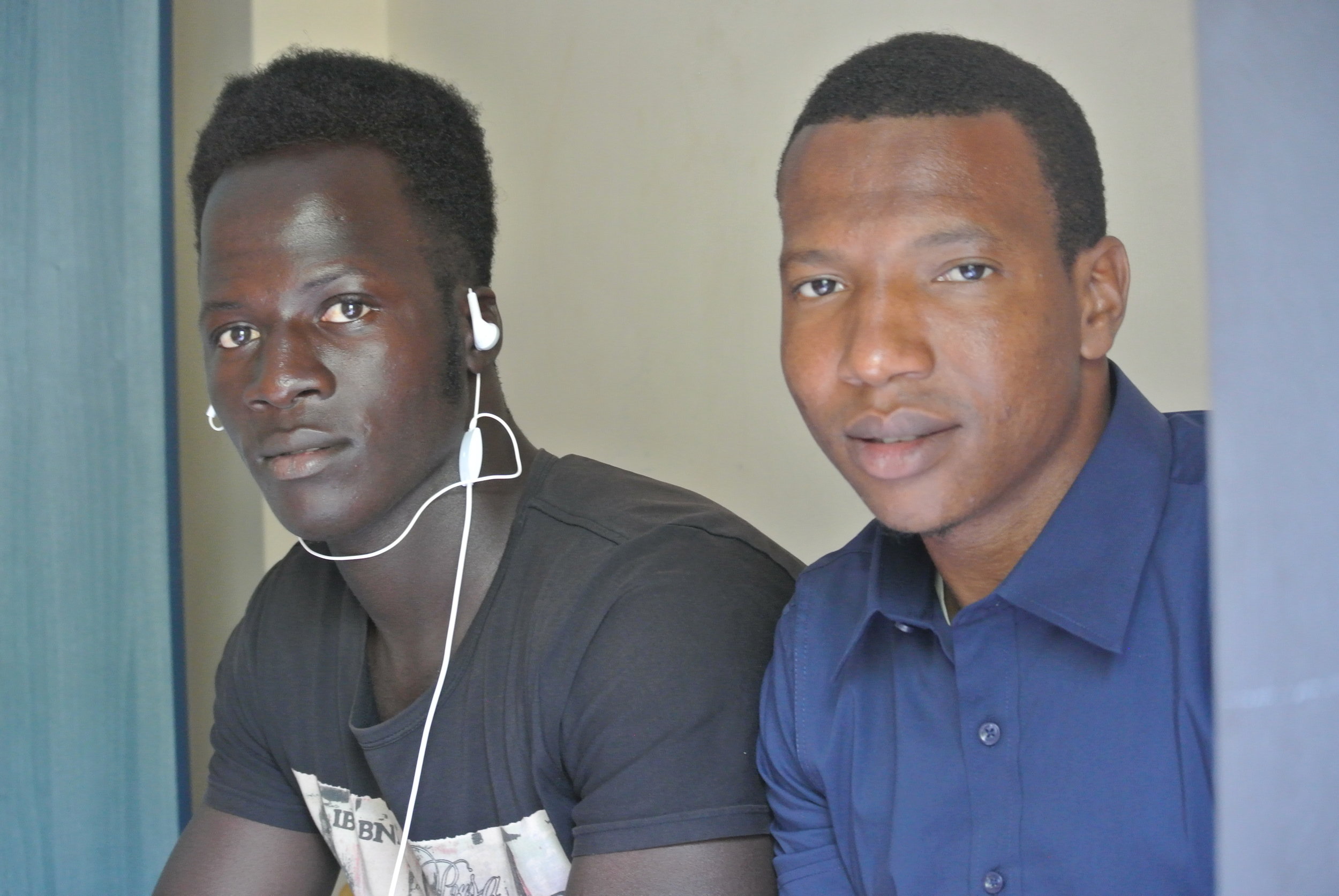   Amadou and his roommate at their housing. Longobardi, Italy; 30 May 2018. ©Pamela Kerpius  