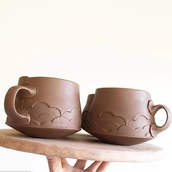 Sarah+Pike+-+two+greenware+mugs+with+hand.jpg