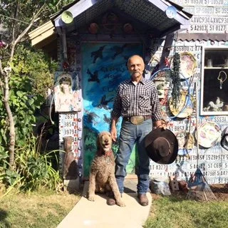 George McCauley - standing outside studio.JPG