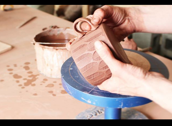 Sarah Pike - greenware mug handle attachment.png