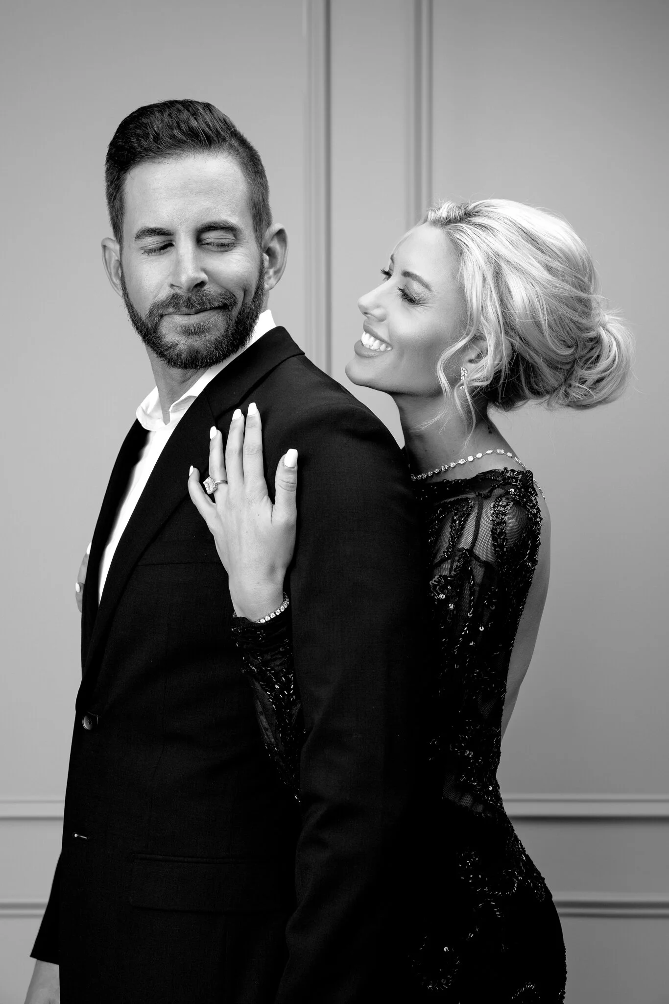 Photoshoot with Selling Sunset's Heather Rae Young and Flip or Flop's Tarek El Moussa — Orange