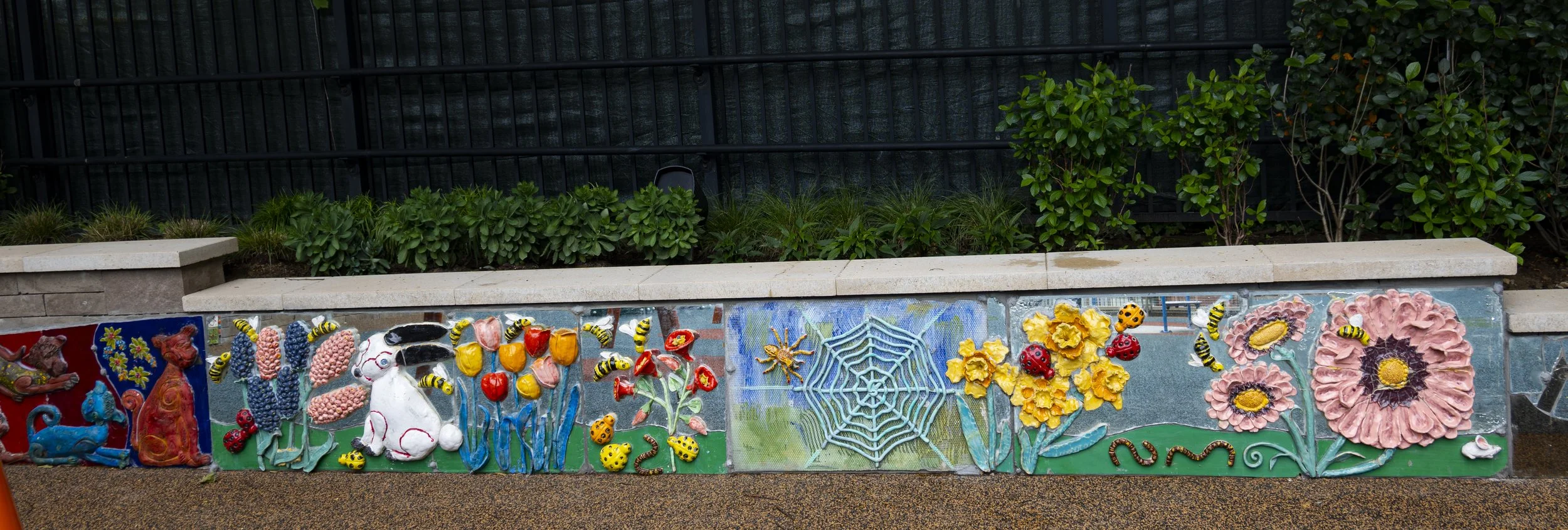  Center section of relief sculpture backwall –&nbsp;bunny, flowers, bees and ladybugs. 