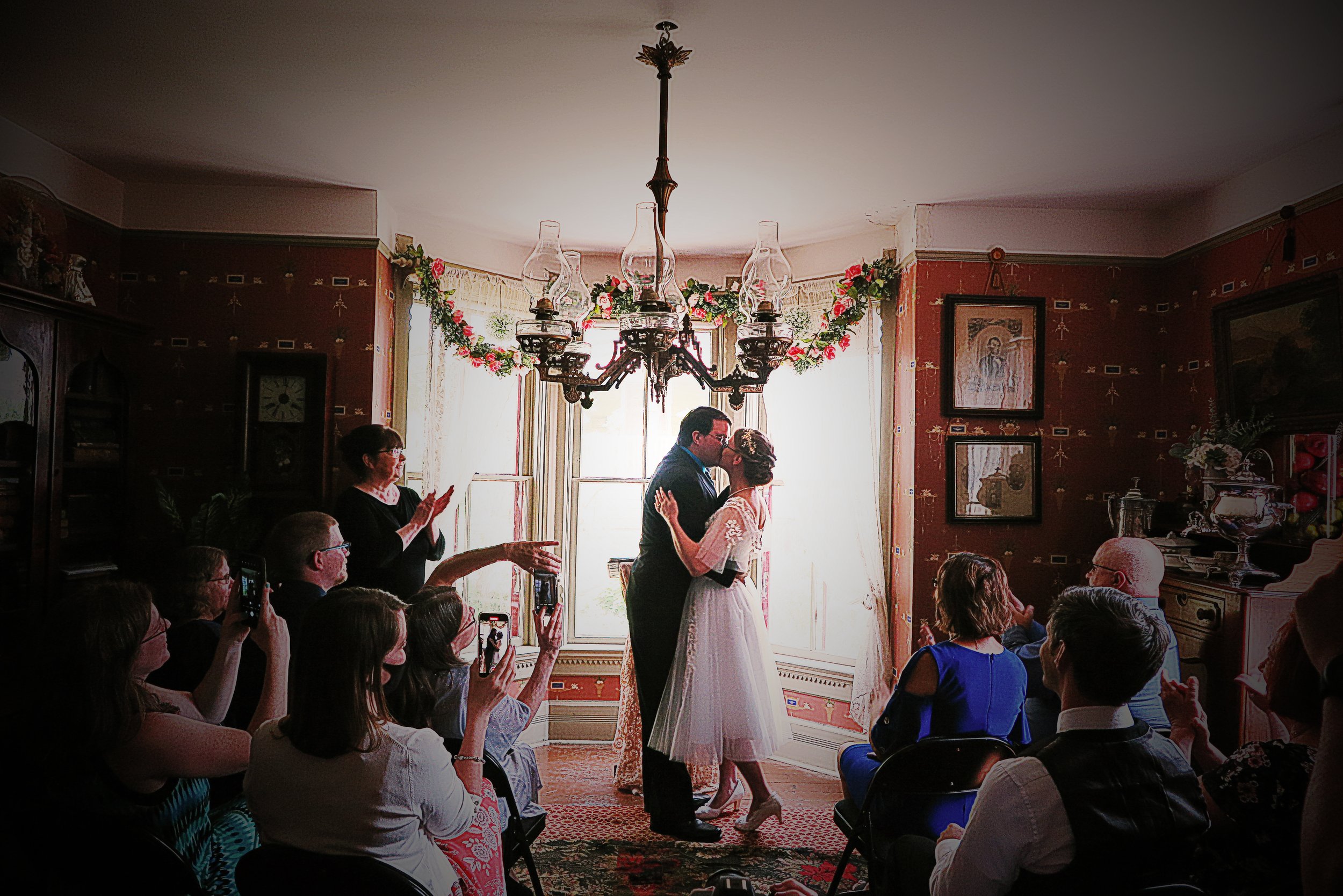 back parlor wedding kiss.jpg