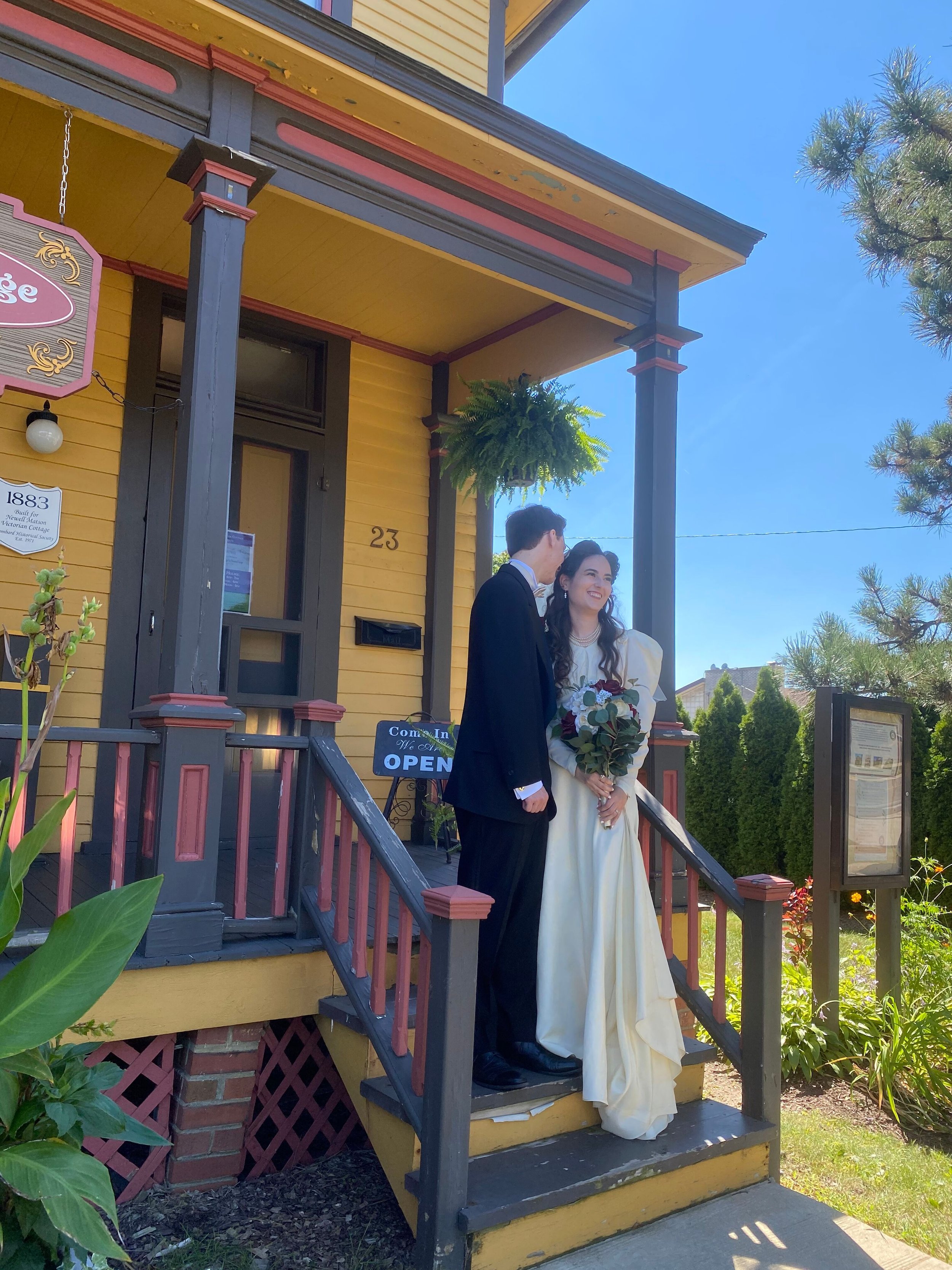 couple on vc front porch kiss.jpg