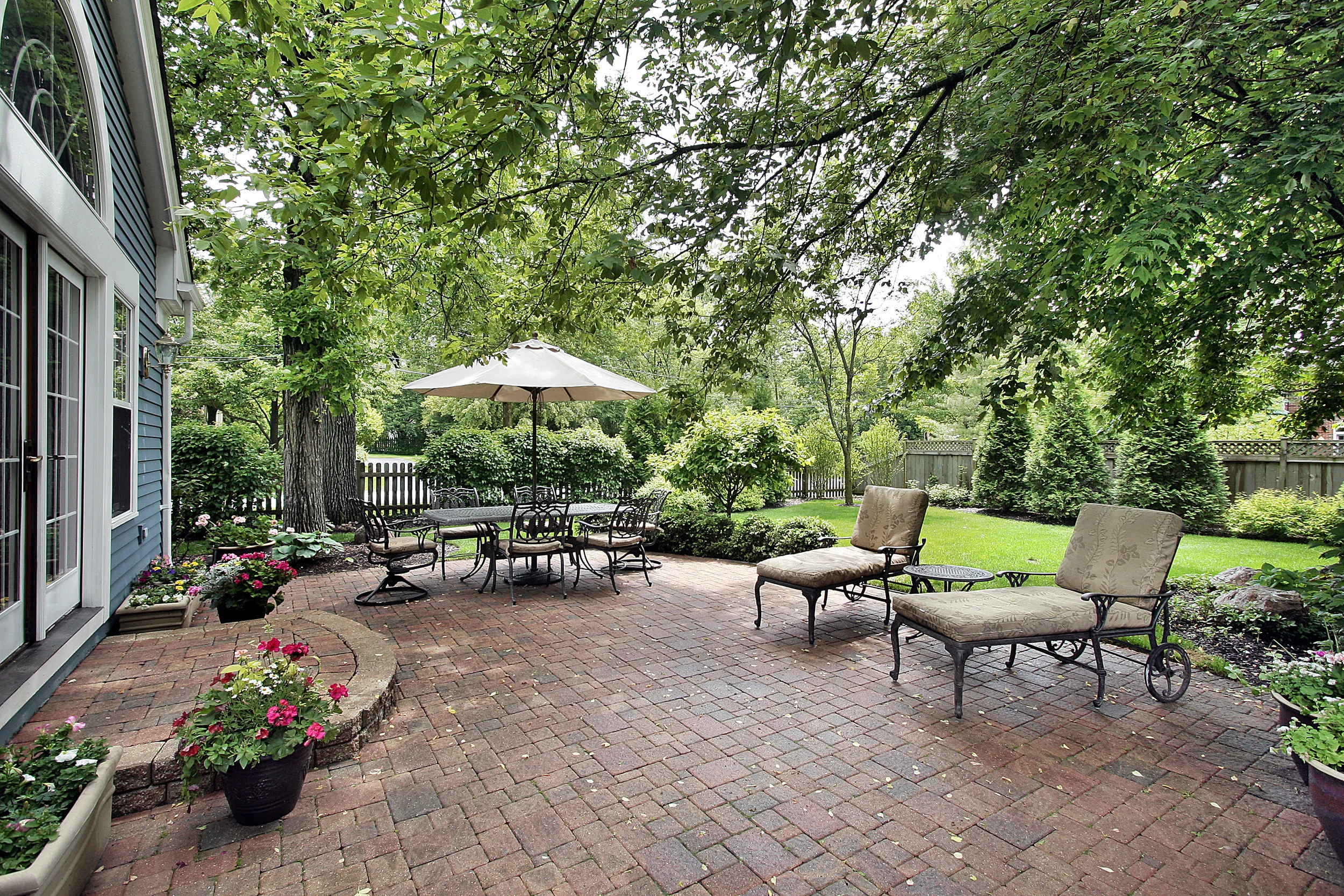 bigstock-Brick-patio-with-table-umbrell-16568294.jpg